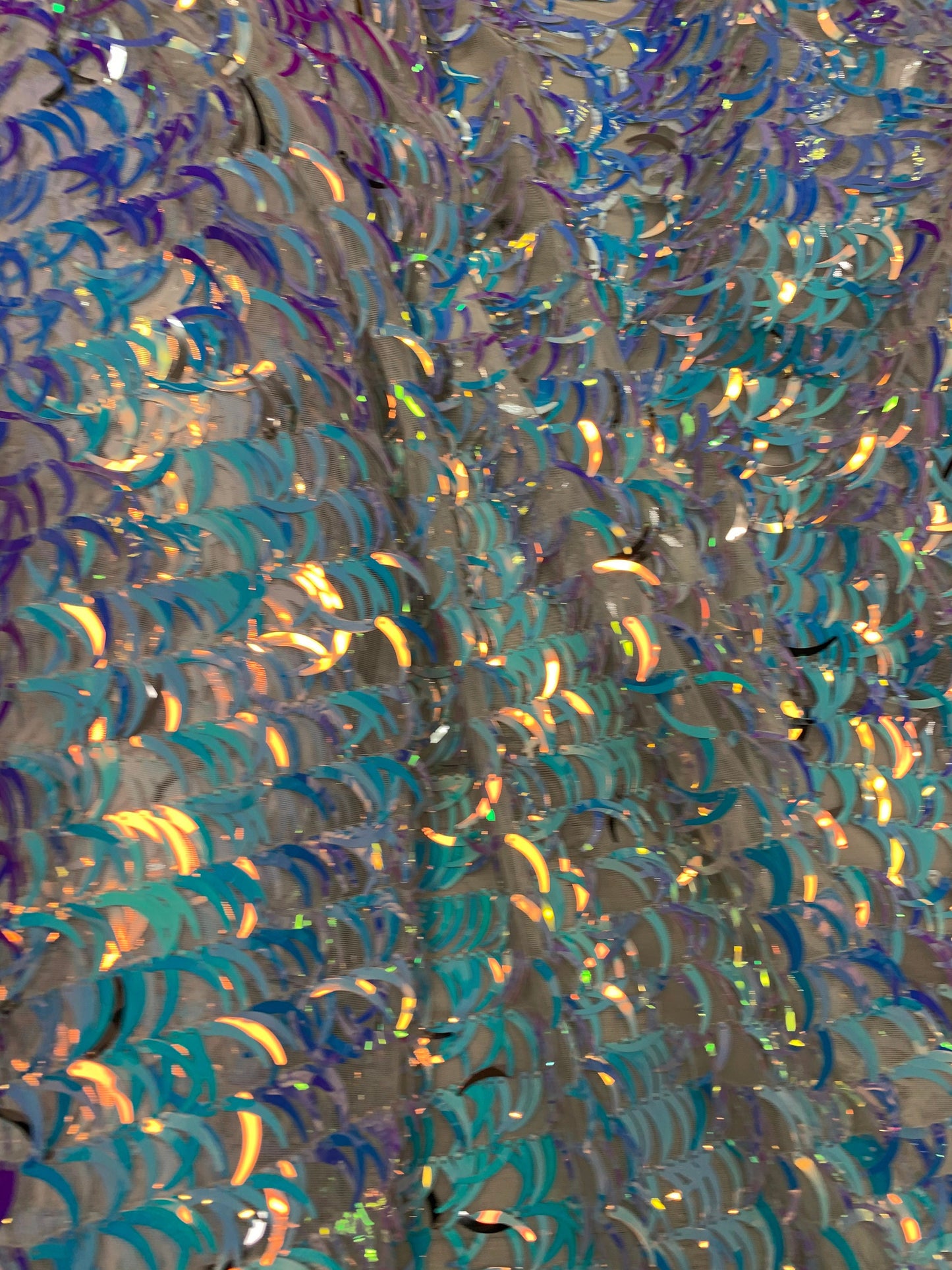 New Iridescent sequins half moon design on stretch mesh 2-way 58/60” Sold by the YD. Ships worldwide from Los Angeles California USA.