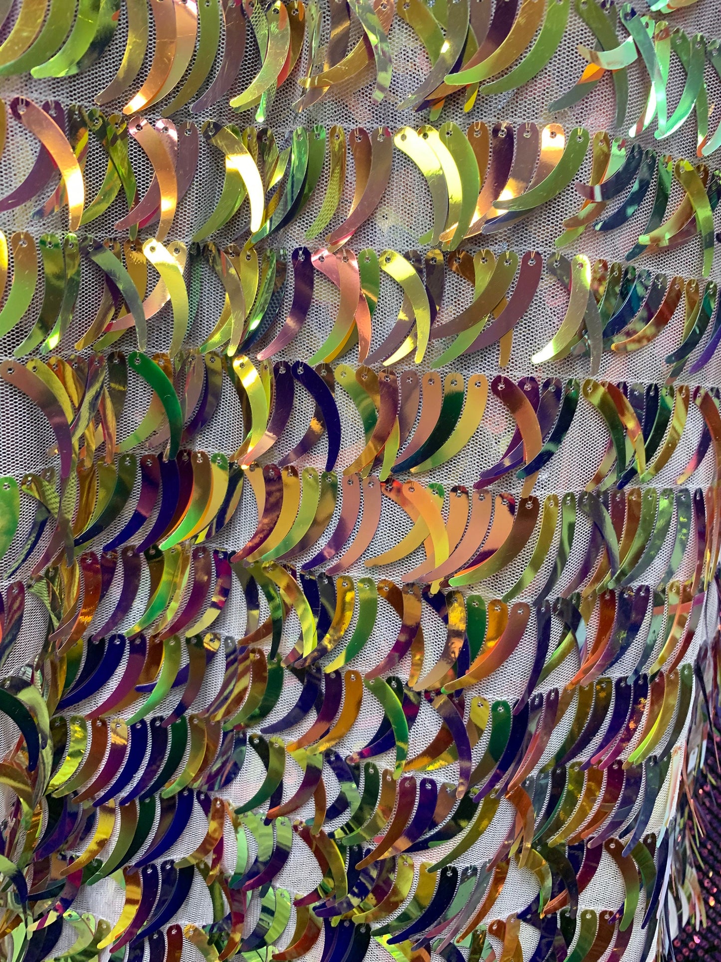 New Iridescent sequins half moon design on stretch mesh 2-way 58/60” Sold by the YD. Ships worldwide from Los Angeles California USA.