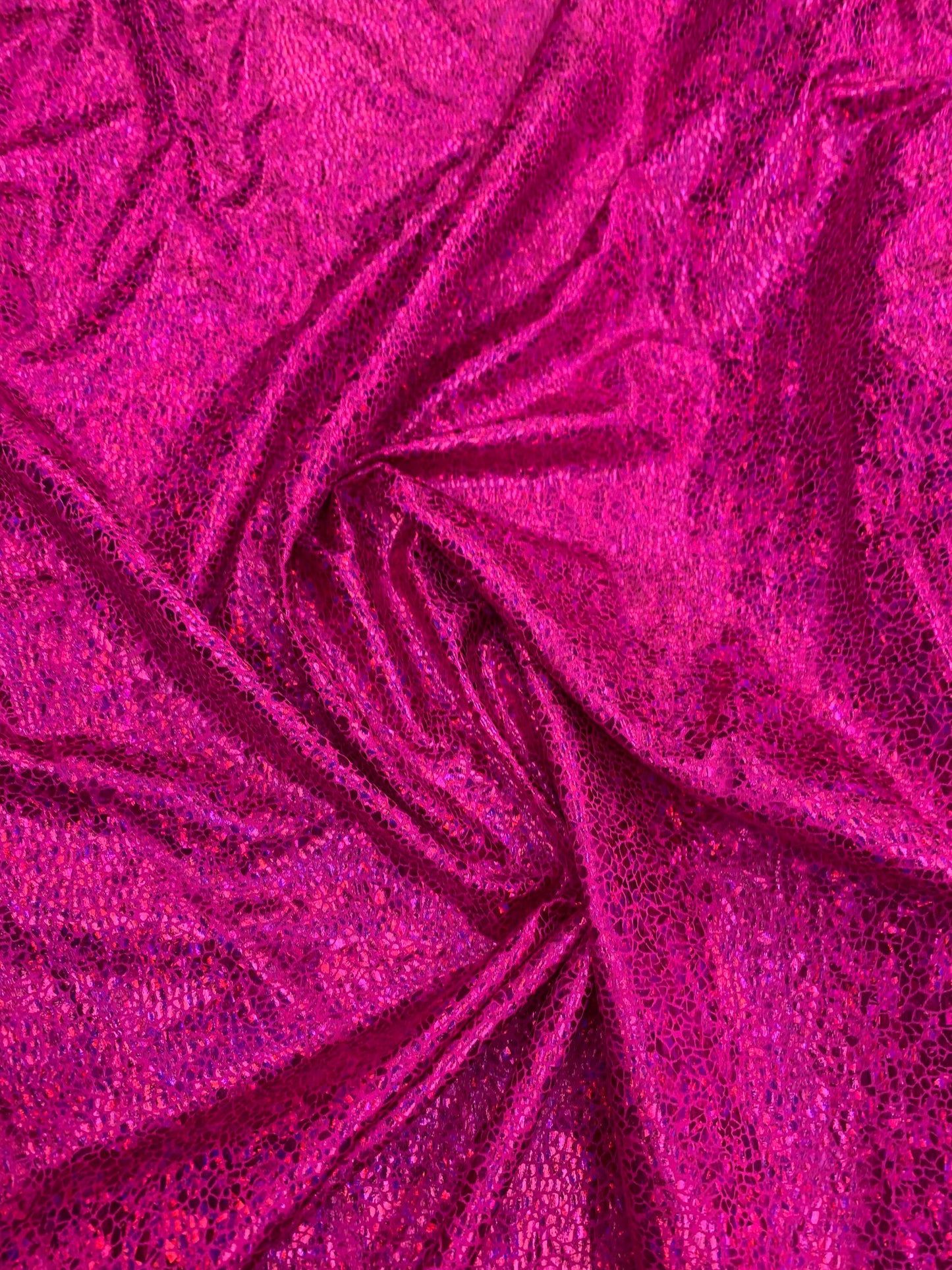 New reptile metallic hologram nylon spandex 4-way stretch 58/60” Sold by the YD. Ships worldwide from Los Angeles California USA.