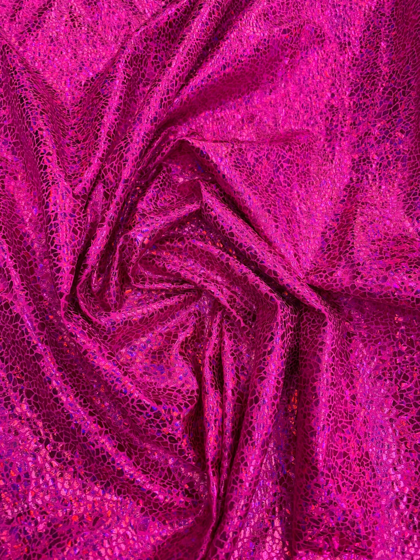 New reptile metallic hologram nylon spandex 4-way stretch 58/60” Sold by the YD. Ships worldwide from Los Angeles California USA.