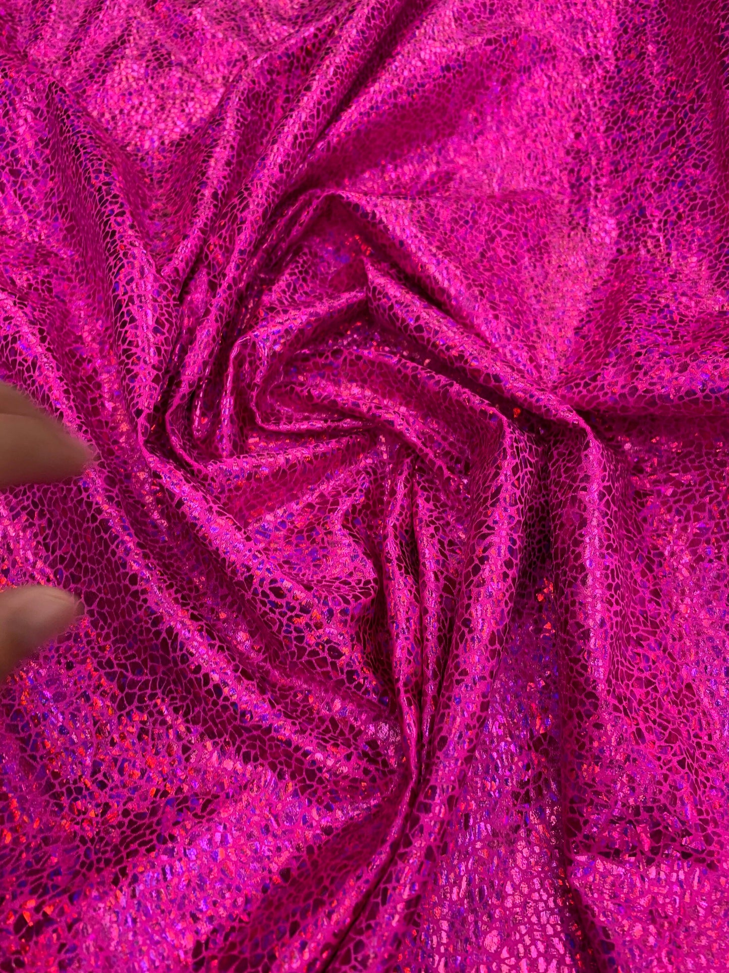 New reptile metallic hologram nylon spandex 4-way stretch 58/60” Sold by the YD. Ships worldwide from Los Angeles California USA.