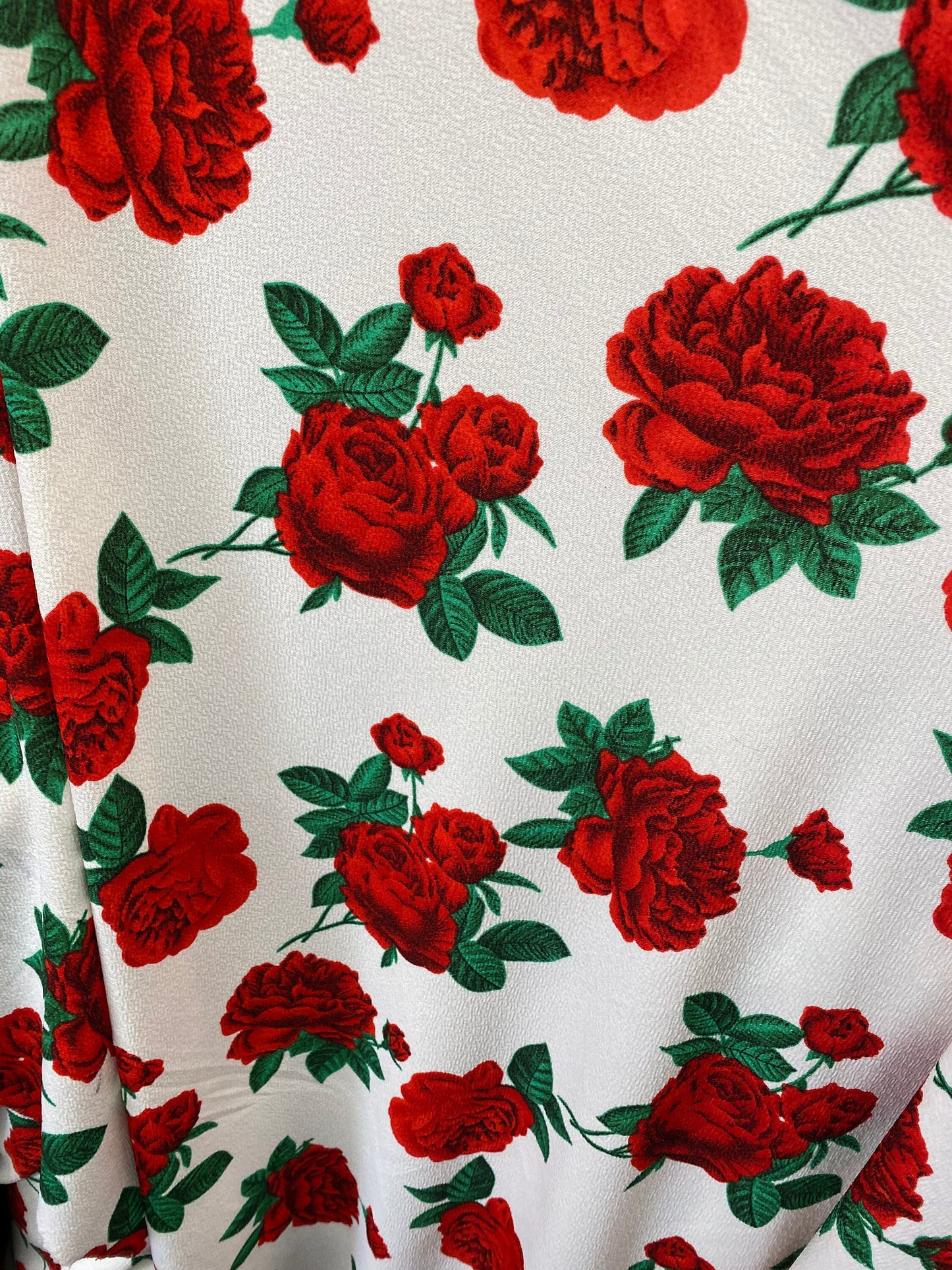 New poly spandex with roses design 4-way stretch 58/60” Sold by the YD. Ships worldwide from Los Angeles California USA.