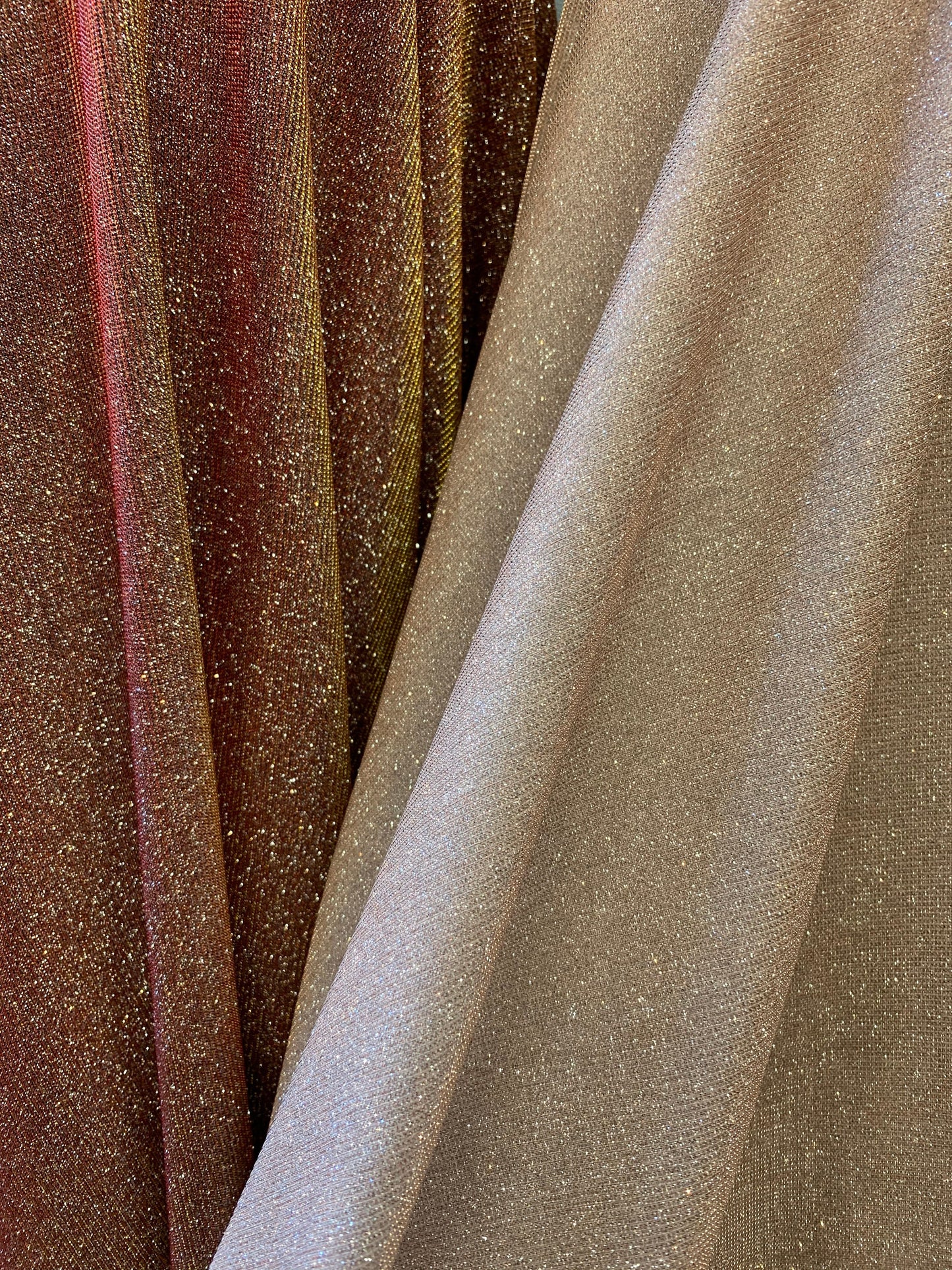 New lame metallic spandex with glitter 2-way stretch 58/60” Sold by the YD. Ships worldwide from Los Angeles California USA.