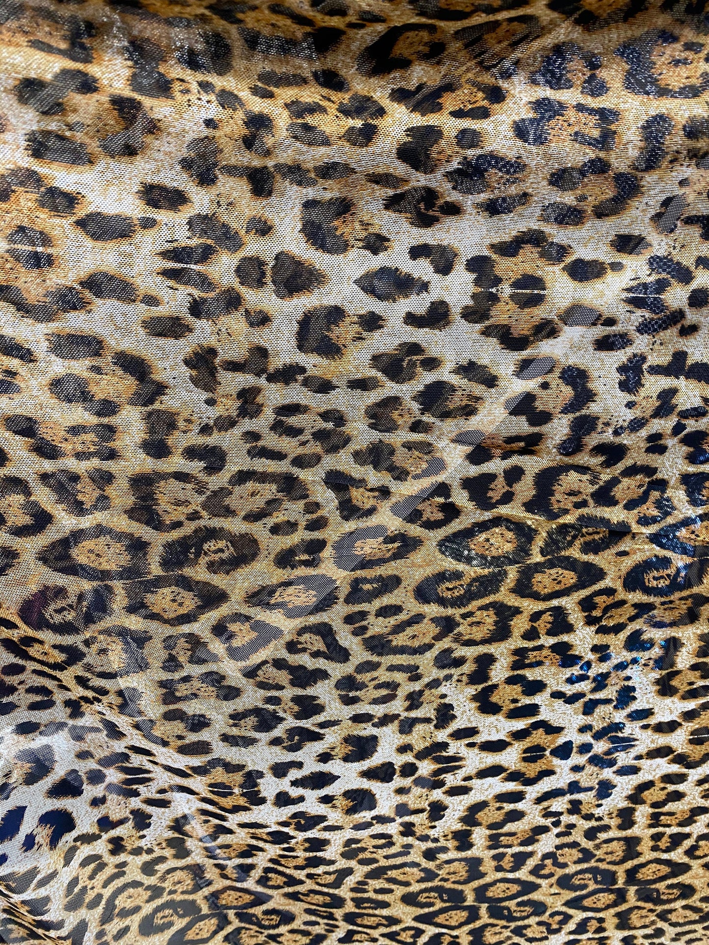New power mesh animal print leopard design 4-way Stretch 58/60” Sold by the YD. Ships worldwide from Los Angeles California USA.