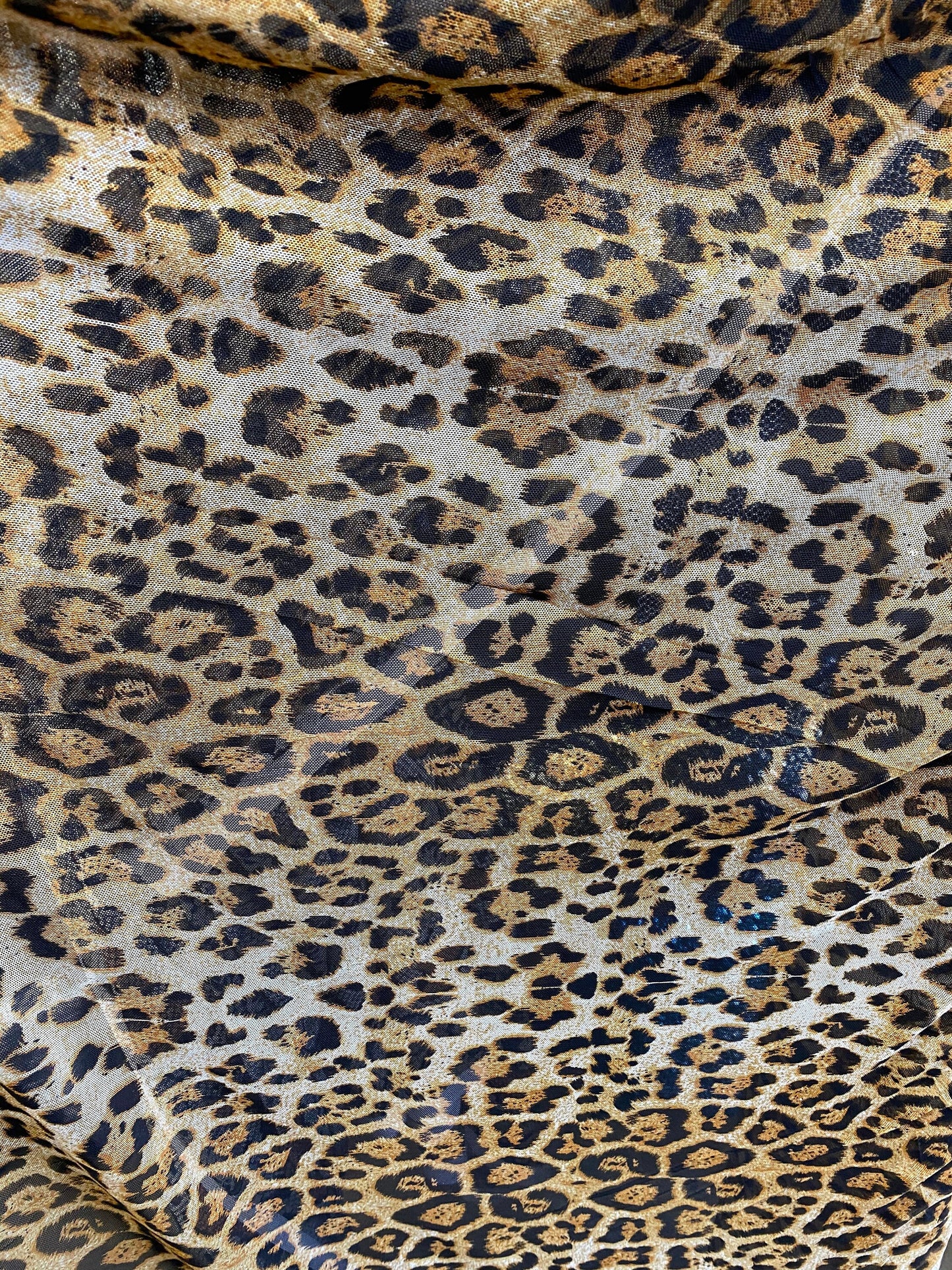 New power mesh animal print leopard design 4-way Stretch 58/60” Sold by the YD. Ships worldwide from Los Angeles California USA.