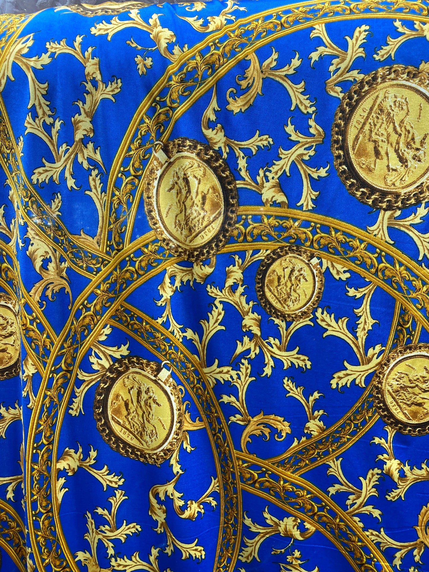 New modern print Sapphire/gold poly spandex medium weight 4-way stretch 58/60” Sold by the YD. Ships worldwide from Los Ángeles California.