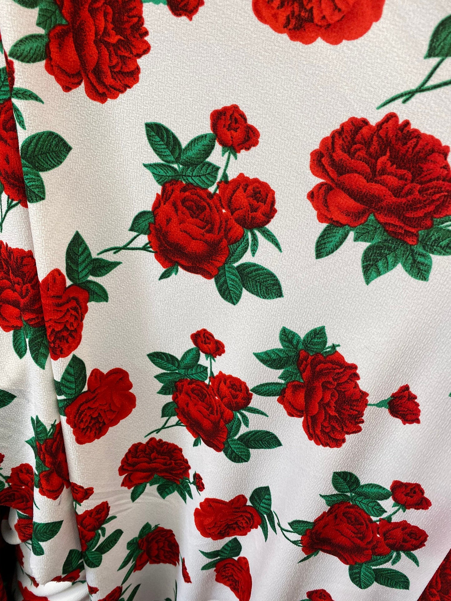 New poly spandex with roses design 4-way stretch 58/60” Sold by the YD. Ships worldwide from Los Angeles California USA.