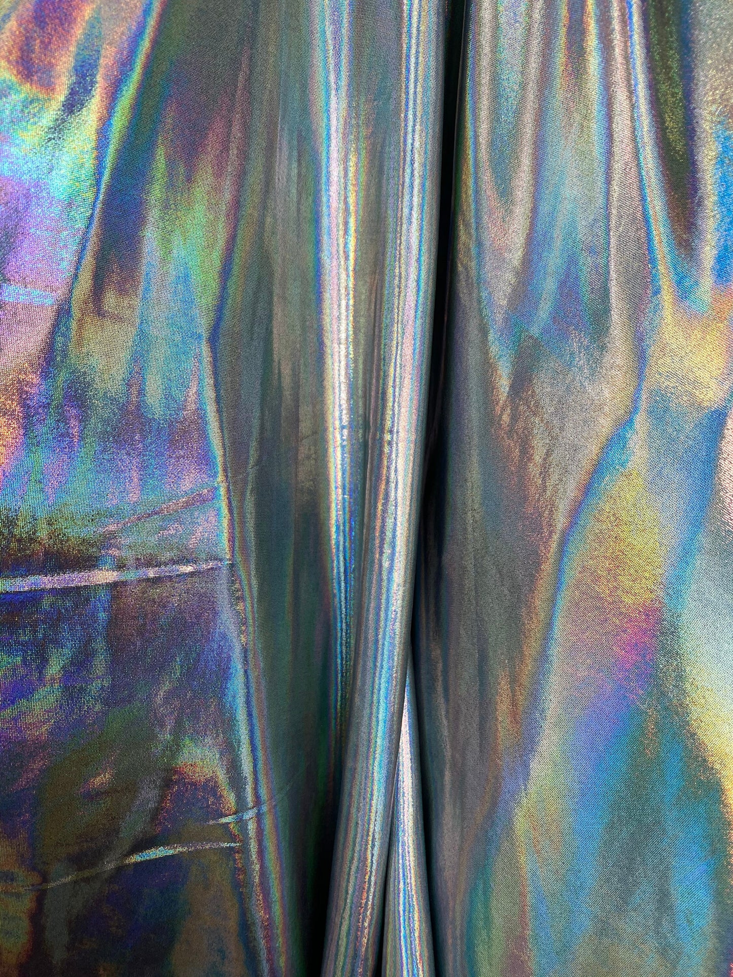 New poly spandex with iridescent metallic foil black/silver 4-way stretch 58/60” Sold by the YD. Ships worldwide from Los Angeles California