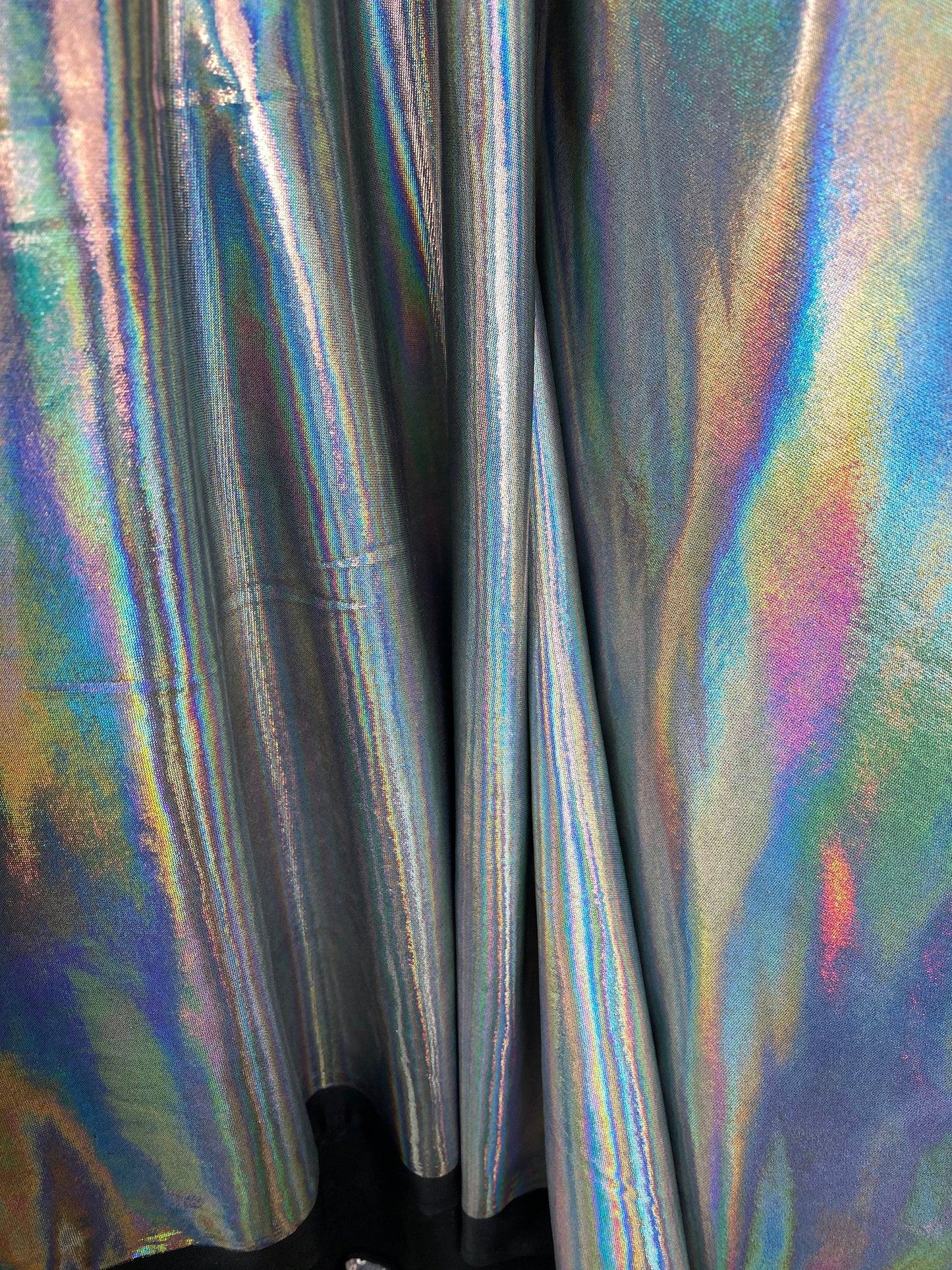 New poly spandex with iridescent metallic foil black/silver 4-way stretch 58/60” Sold by the YD. Ships worldwide from Los Angeles California