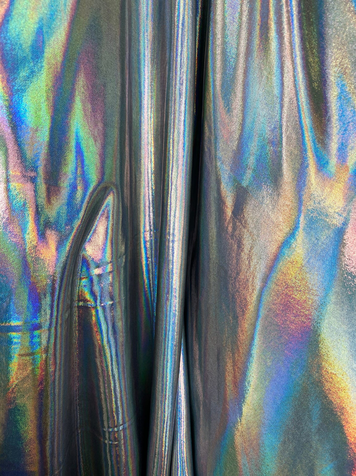 New poly spandex with iridescent metallic foil black/silver 4-way stretch 58/60” Sold by the YD. Ships worldwide from Los Angeles California