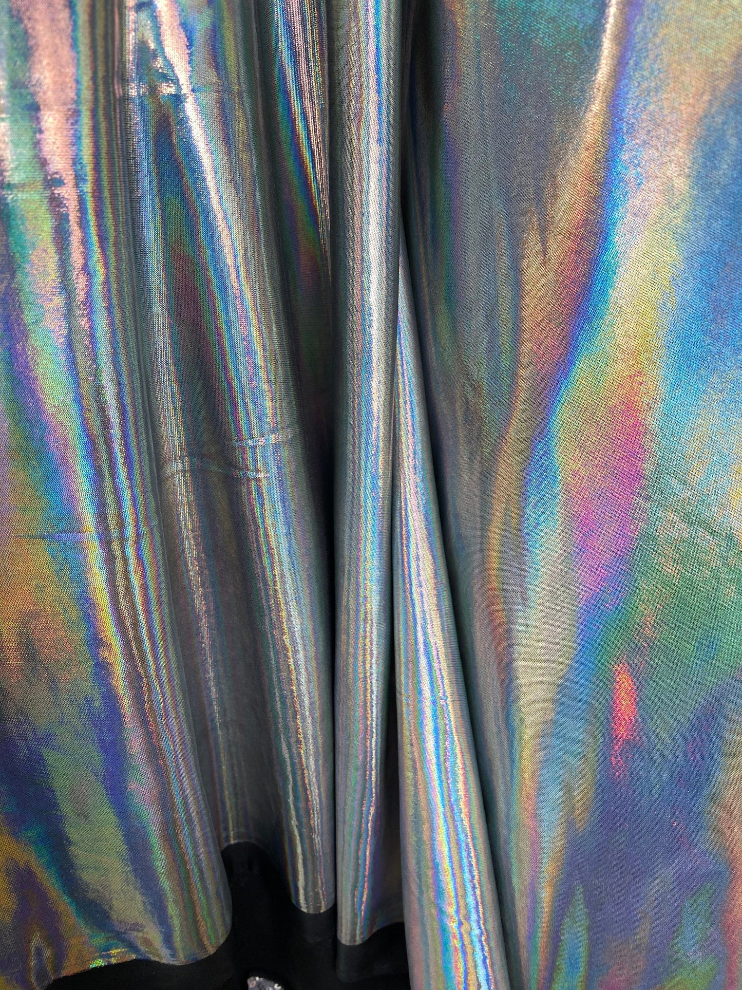 New poly spandex with iridescent metallic foil black/silver 4-way stretch 58/60” Sold by the YD. Ships worldwide from Los Angeles California