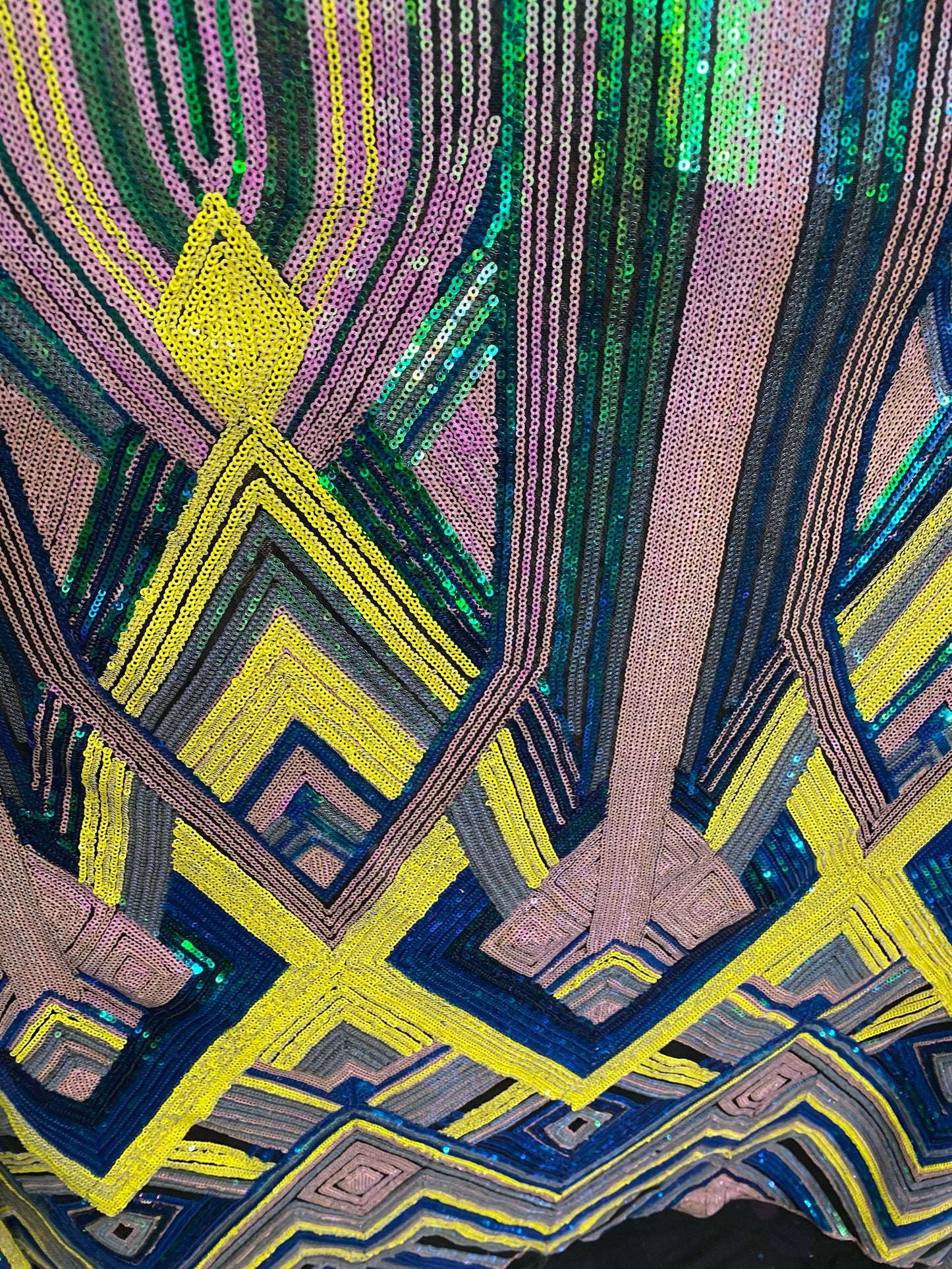 New Geometric design multicolor sequins on stretch mesh 2-way 55/57” Sold by the YD. Ships worldwide from Los Angeles California USA.