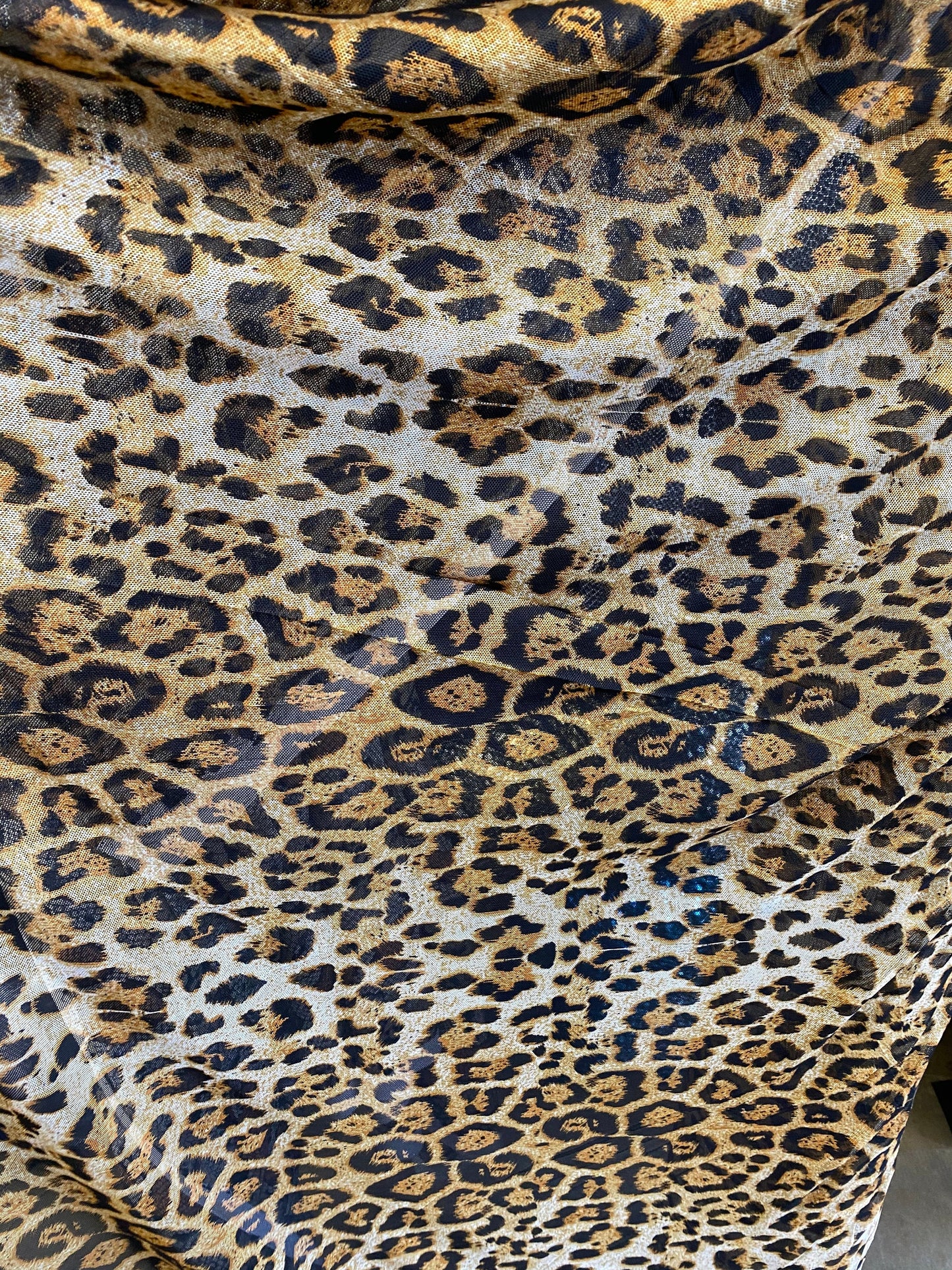 New power mesh animal print leopard design 4-way Stretch 58/60” Sold by the YD. Ships worldwide from Los Angeles California USA.