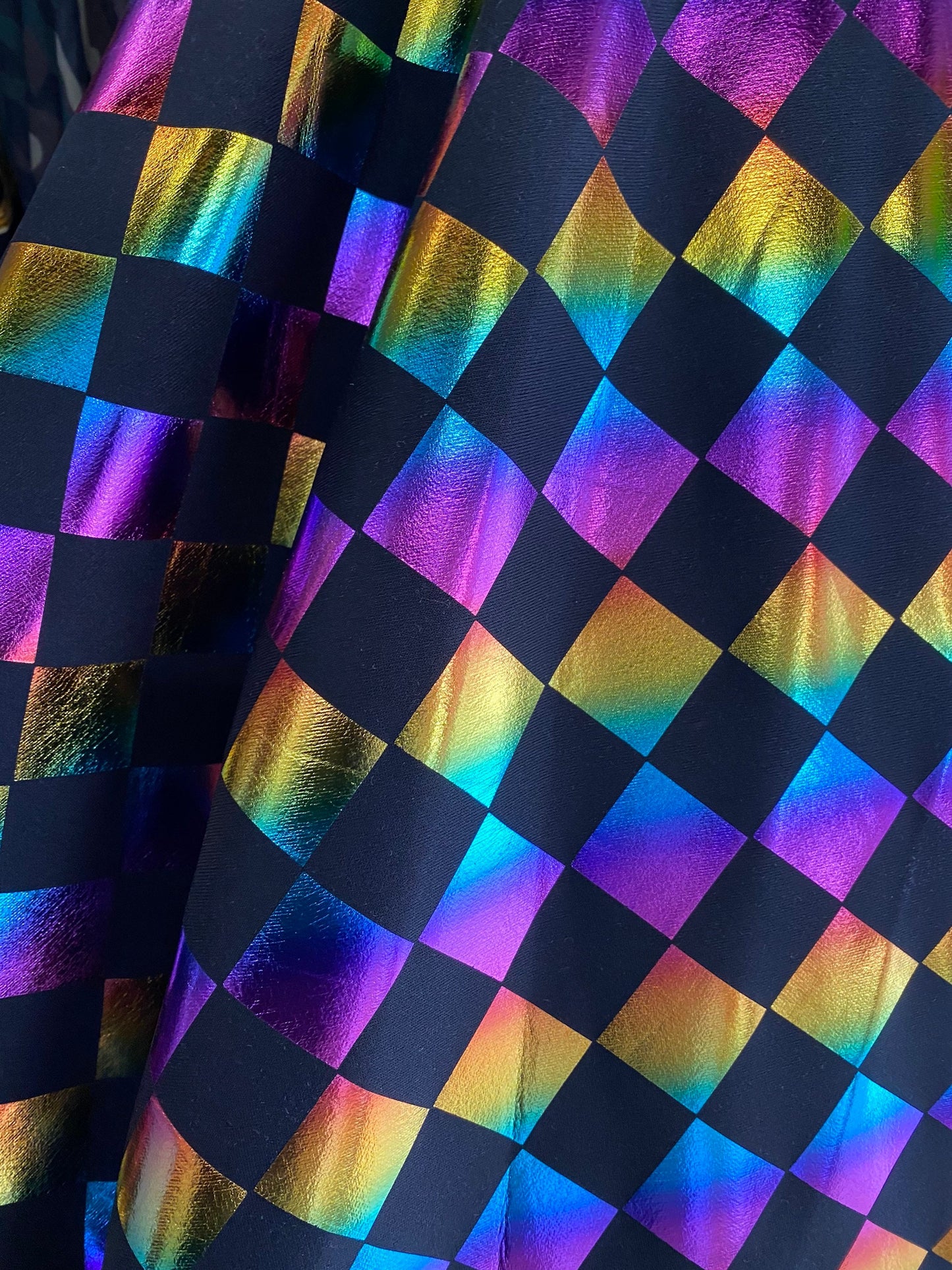 New Diamond design rainbow metallic super techno multicolor 2-way stretch 58/60” Sold by the YD. Ships worldwide from Los Angeles CA USA.