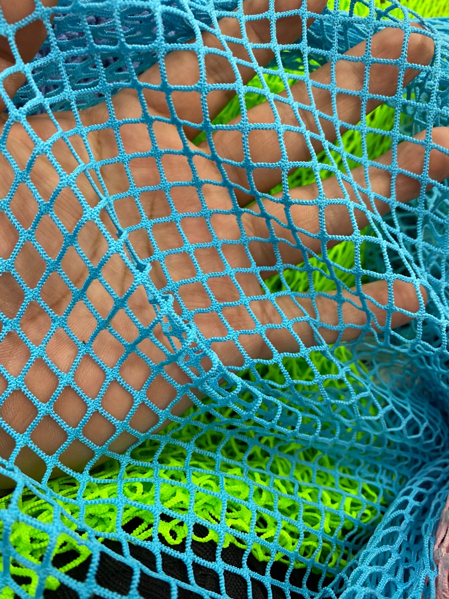 New fishnet medium size nylon mesh 4-way stretch 58/60” Sold by the YD. Ships worldwide from Los Angeles California USA.