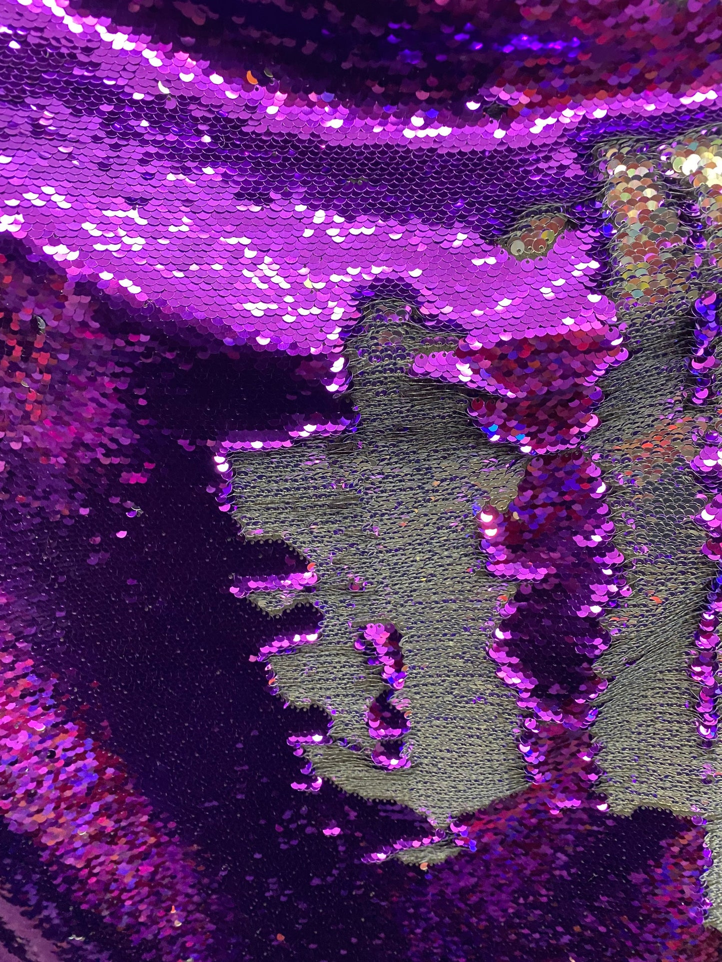 New Reversible flip up sequins purple/silver 5mm seq with Lycra base 58/60” sold by the yd. Ships worldwide from Los Angeles California USA.