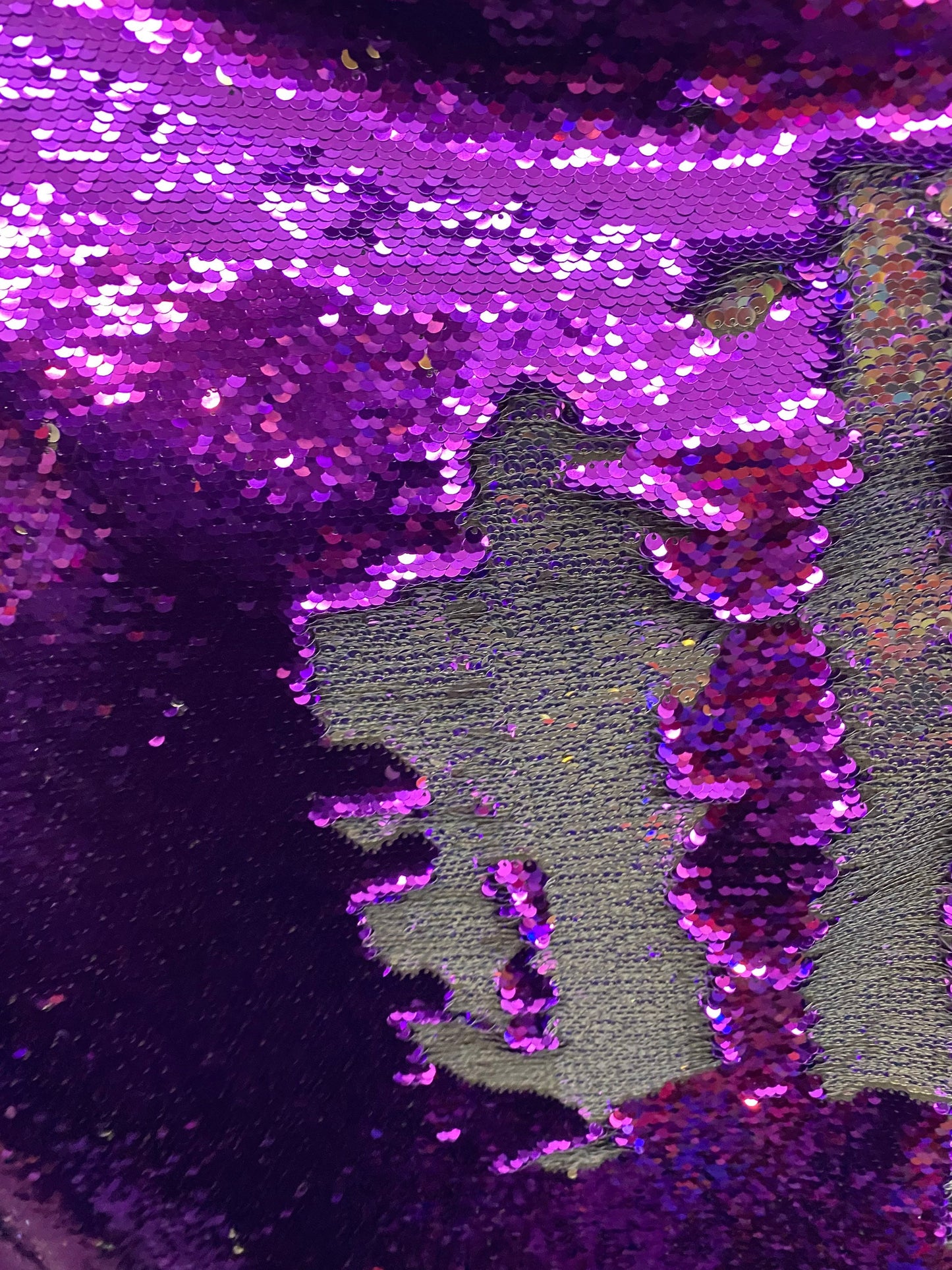 New Reversible flip up sequins purple/silver 5mm seq with Lycra base 58/60” sold by the yd. Ships worldwide from Los Angeles California USA.