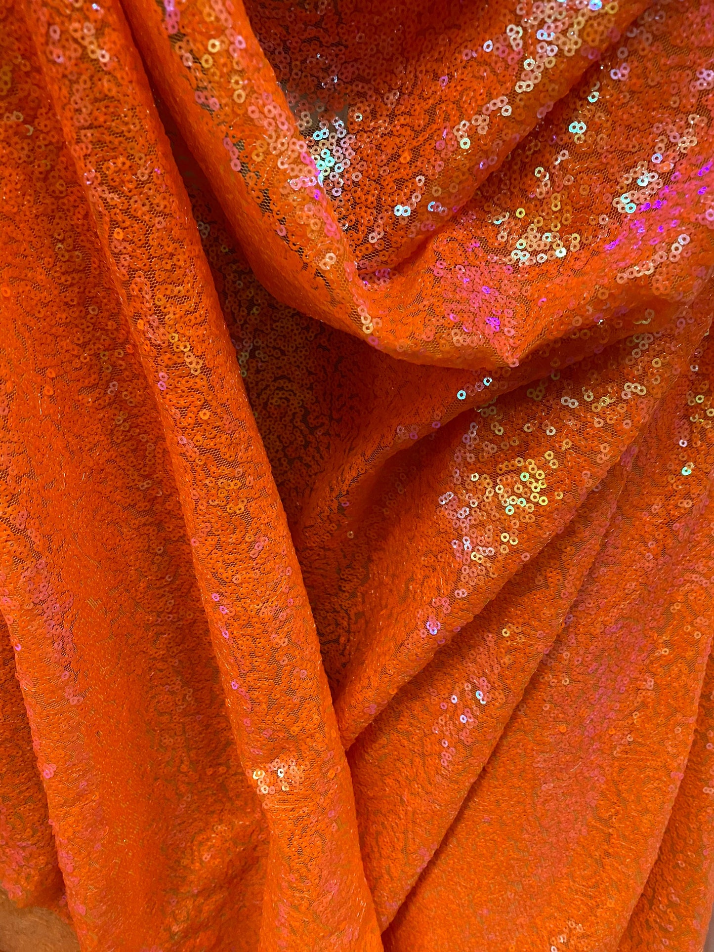 New neon colors mini glitzy sequins on stretch mesh 55/57” 2-way Sold by the YD. Ships worldwide from Los Angeles California USA.