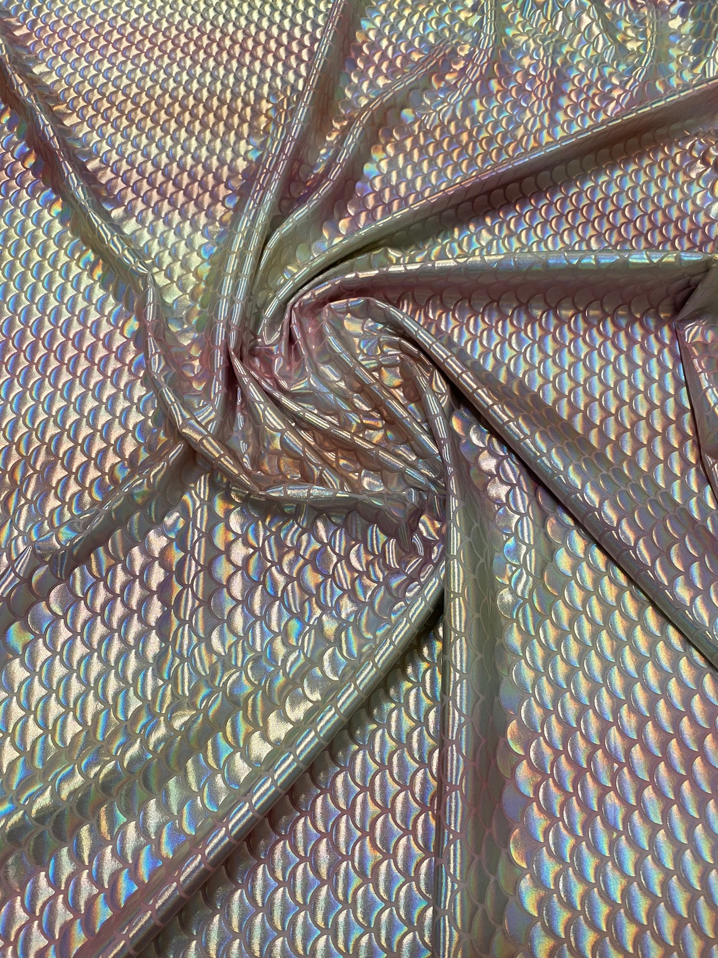 New Rainbow mermaid design Blush/silver iridescent metallic nylon spandex 4-way stretch 58/60” Sold by the YD. Ships worldwide from L.A CA.