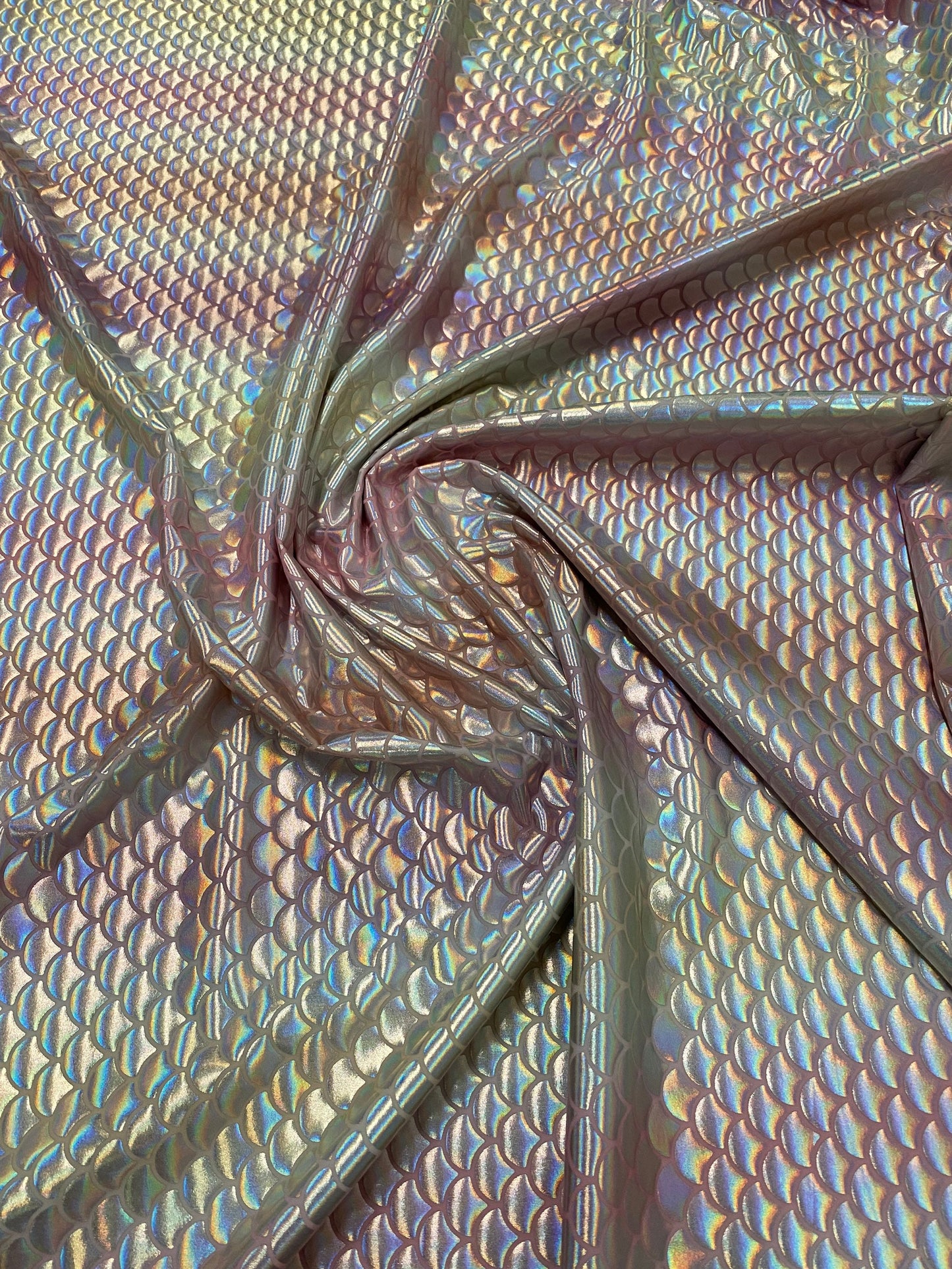 New Rainbow mermaid design Blush/silver iridescent metallic nylon spandex 4-way stretch 58/60” Sold by the YD. Ships worldwide from L.A CA.
