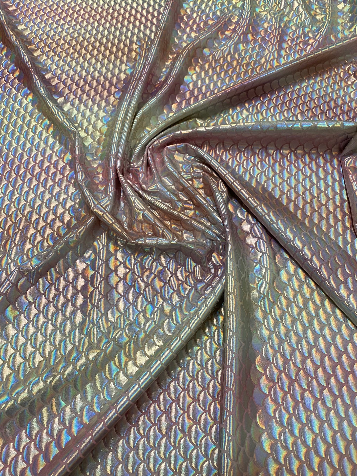 New Rainbow mermaid design Blush/silver iridescent metallic nylon spandex 4-way stretch 58/60” Sold by the YD. Ships worldwide from L.A CA.
