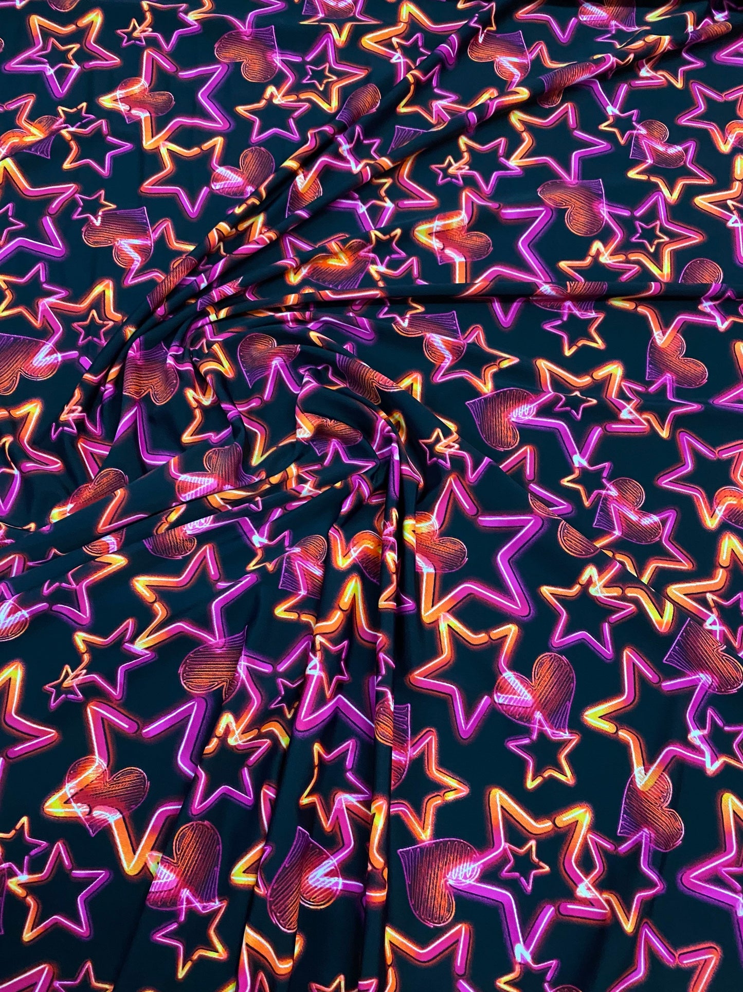 New 3D stars design black multicolor print on nylon spandex 4-way Stretch 58/60” Sold by the YD. Ships worldwide from Los Angeles California
