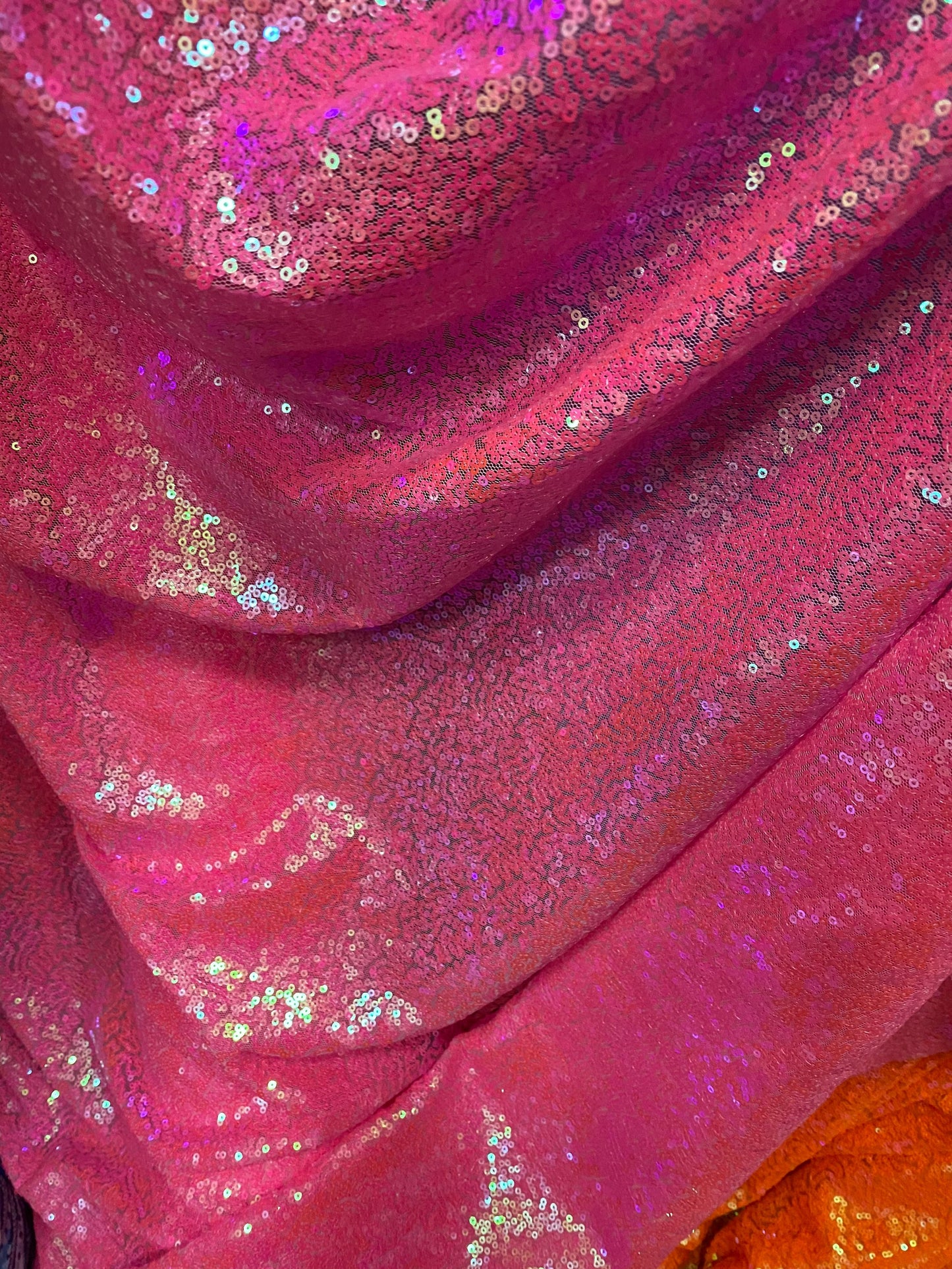 New neon colors mini glitzy sequins on stretch mesh 55/57” 2-way Sold by the YD. Ships worldwide from Los Angeles California USA.
