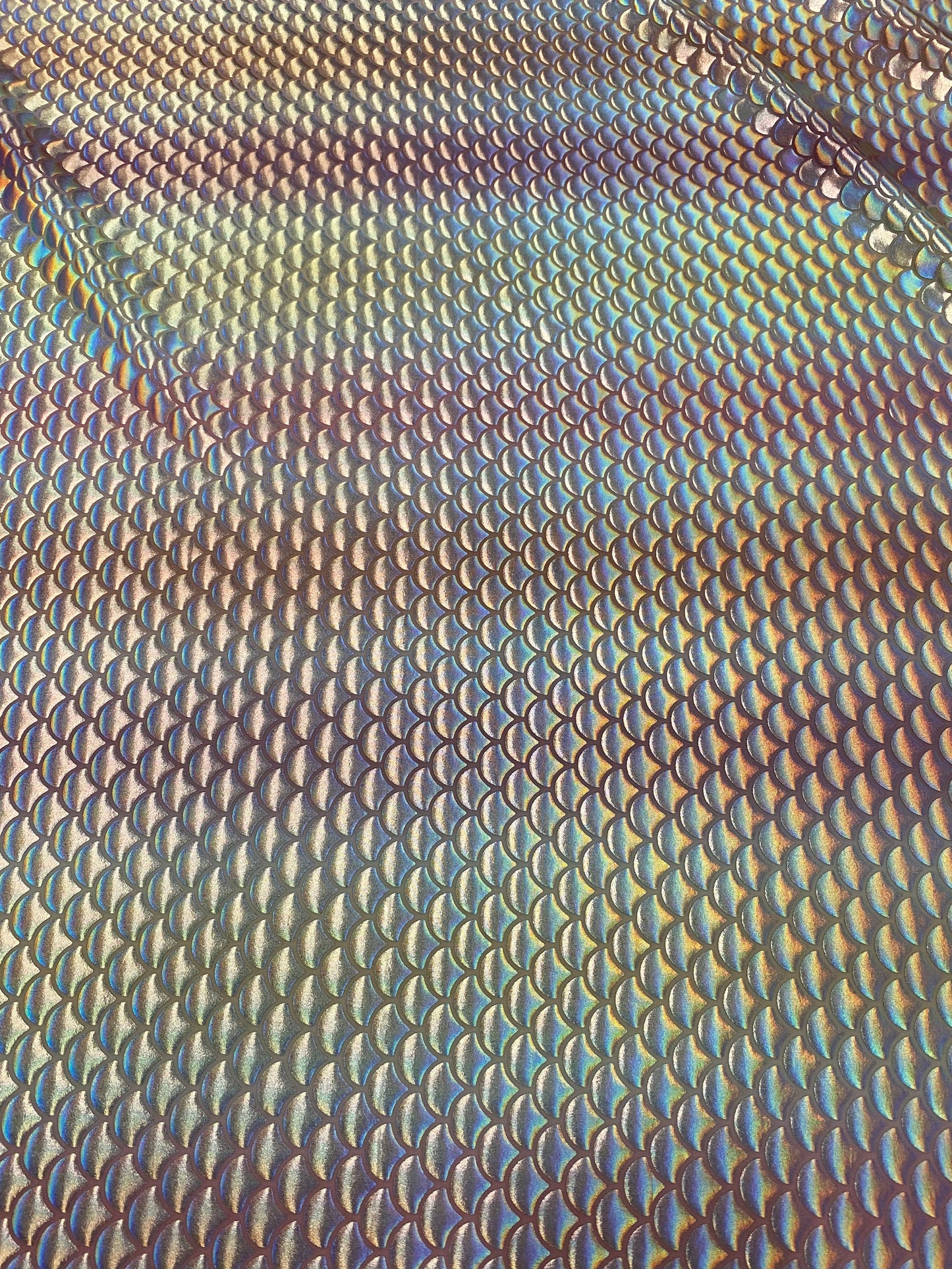 New Rainbow mermaid design Blush/silver iridescent metallic nylon spandex 4-way stretch 58/60” Sold by the YD. Ships worldwide from L.A CA.