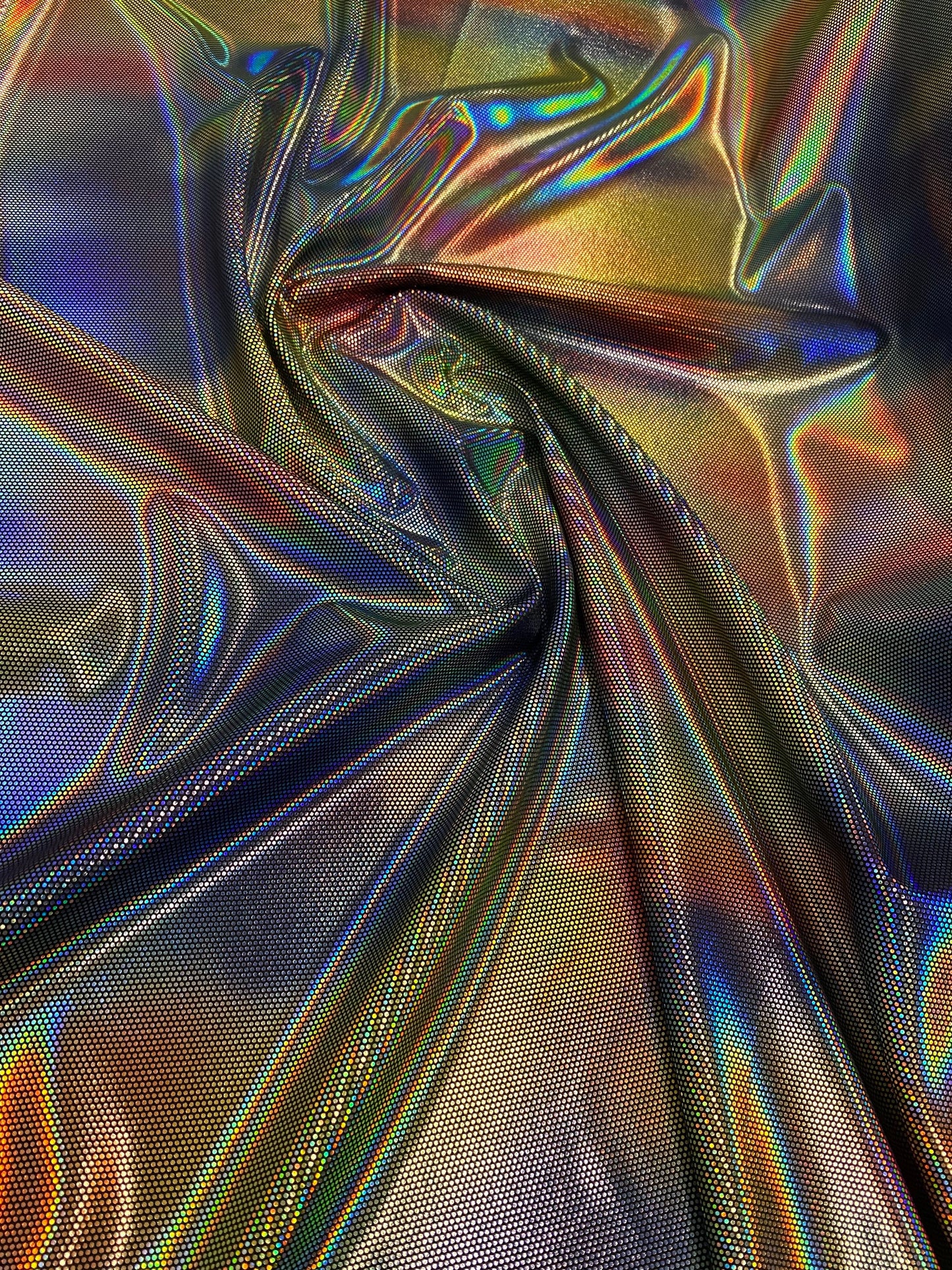 Luxury Spectrum iridescent hologram metallic foil on stretch velvet 58/60” 4-way stretch 58/60” Sold by the YD. Ships worldwide from L.A CA.