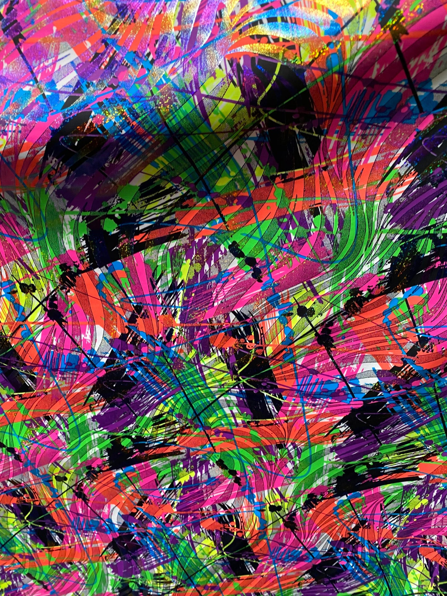 New splatter paint zebra design multicolor metallic nylon spandex 4-way stretch 58/60” Sold by the YD. Ships worldwide from L.A CA USA.