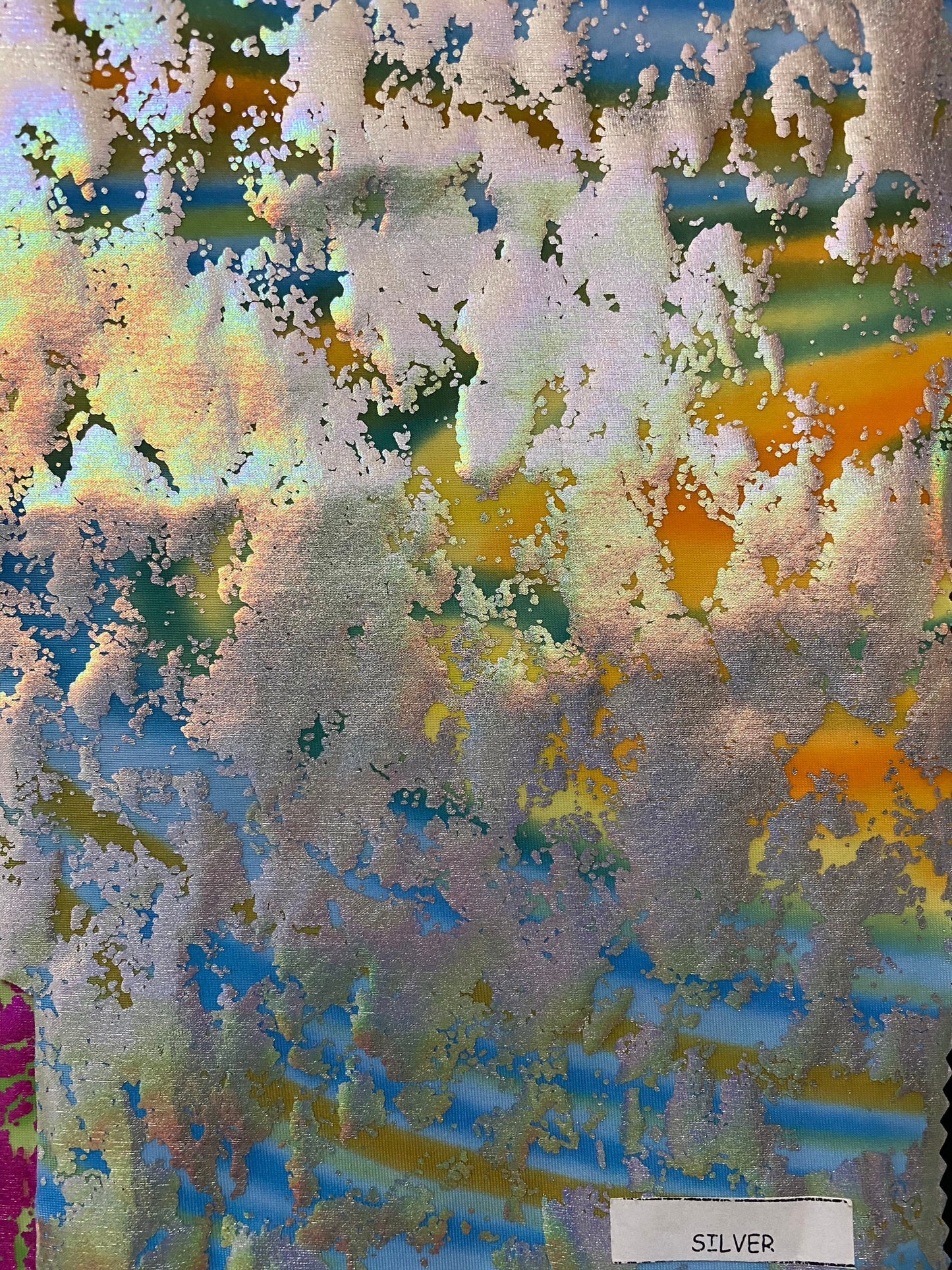 New metallic nylon spandex with lava print foil tie dye base 4way stretch 58/60” Sold by the YD. Ships worldwide from Los Angeles California