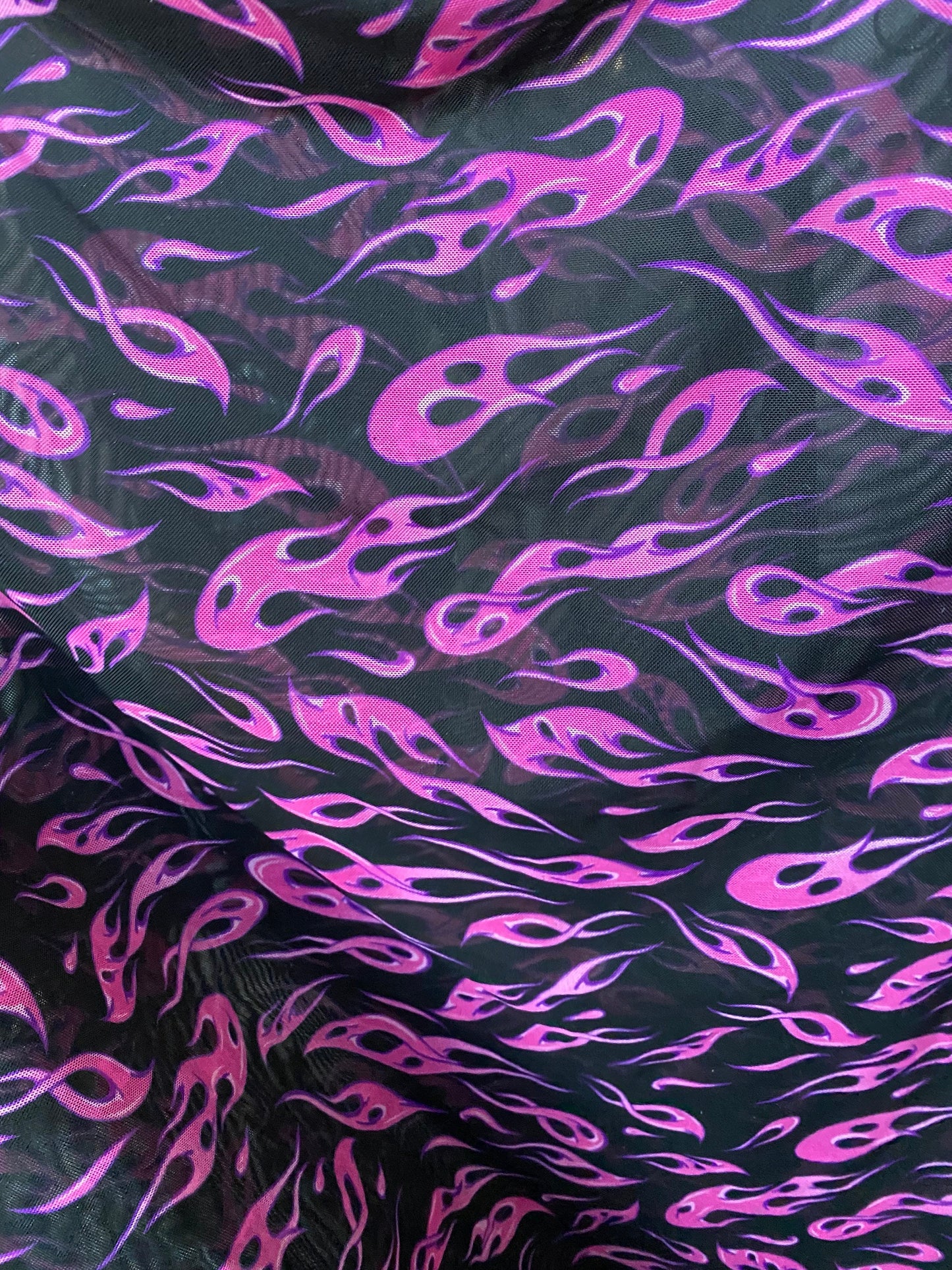 New modern fire flame design print on power nylon mesh 4way stretch 58/60” Sold by the YD. Ships worldwide from Los Angeles California USA.