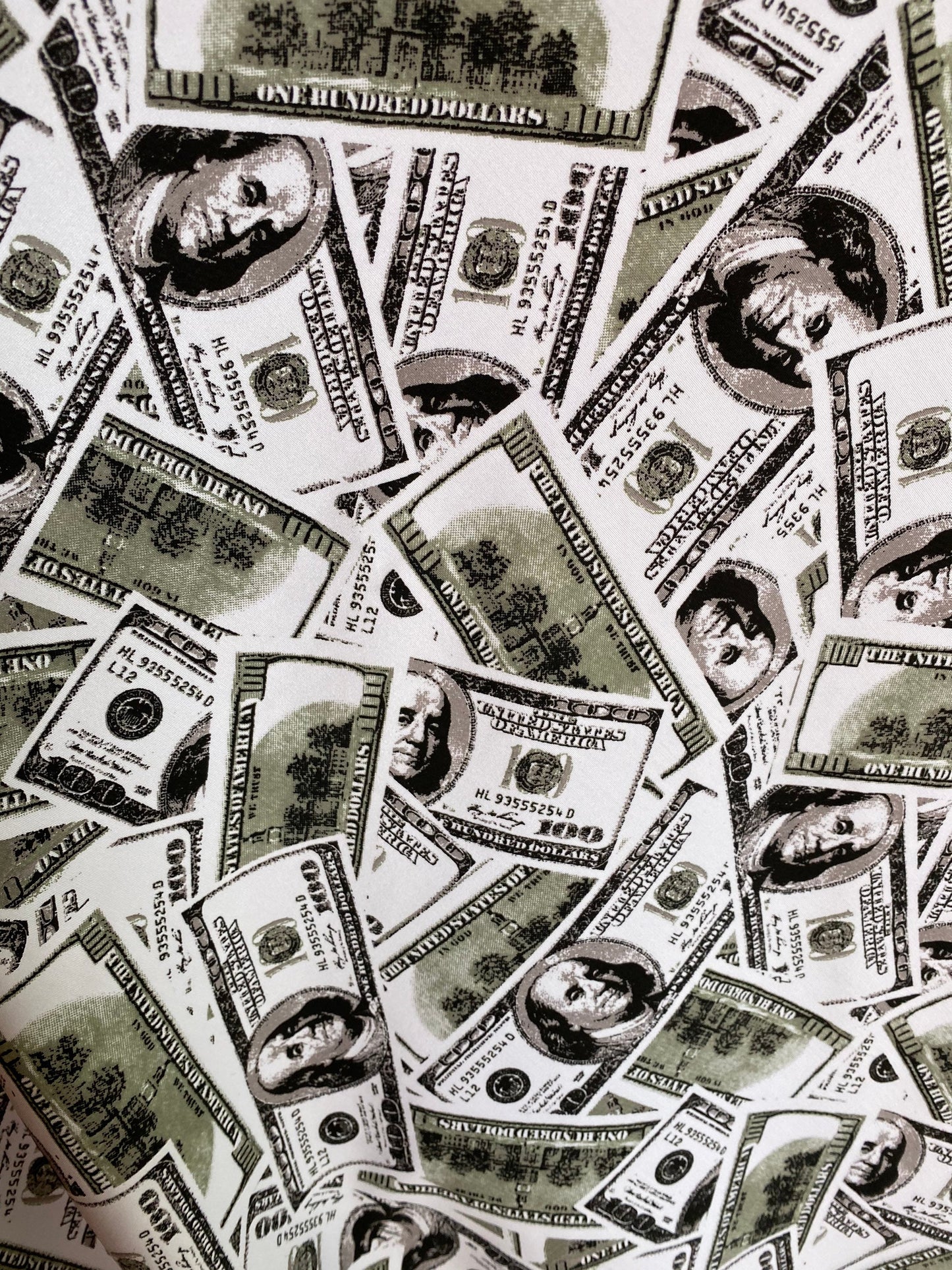 New money print design 100 dollars bill all over white/green print on nylon spandex 4-way stretch 58/60” Sold by the YD. Ships worldwide