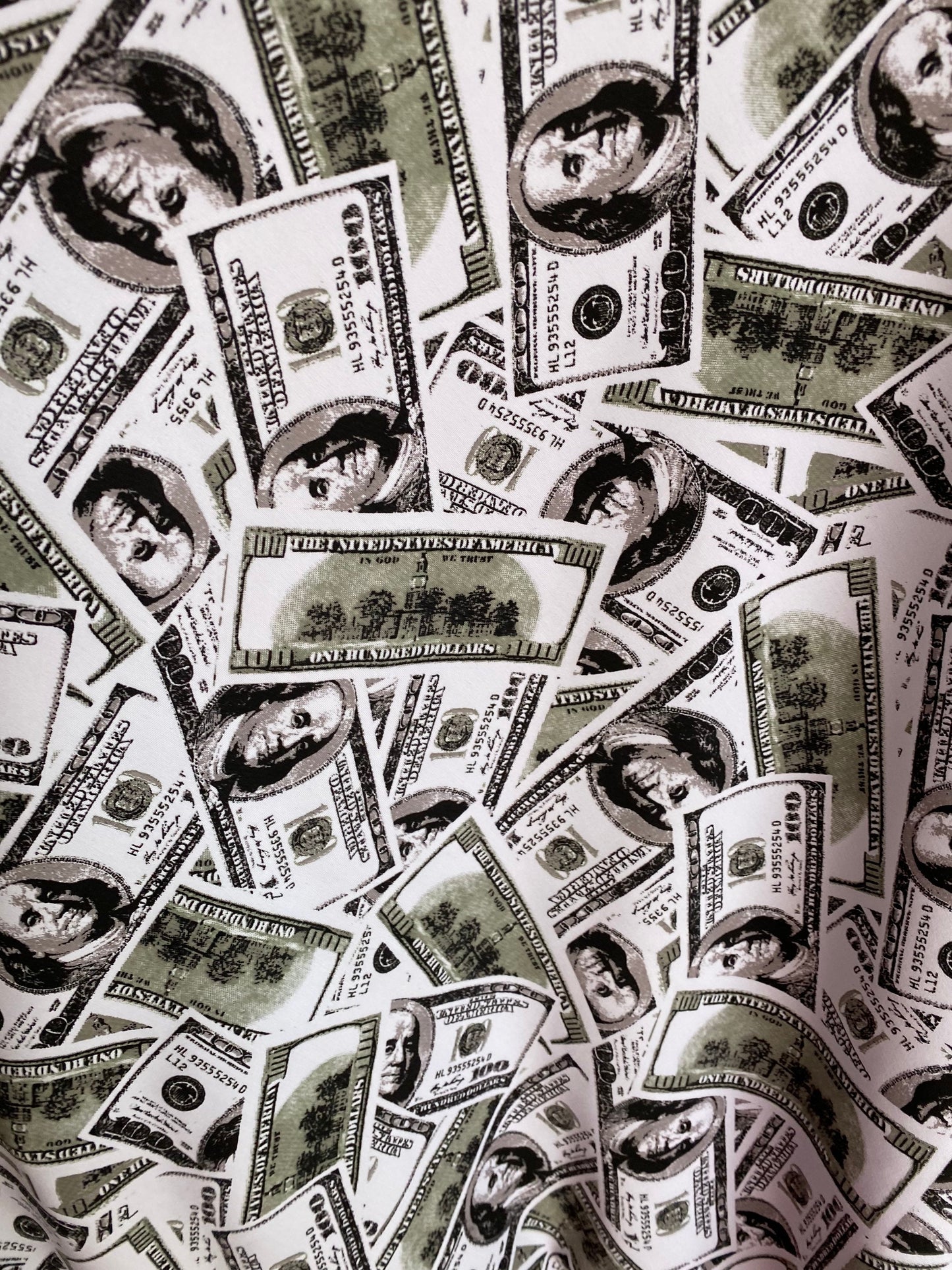 New money print design 100 dollars bill all over white/green print on nylon spandex 4-way stretch 58/60” Sold by the YD. Ships worldwide