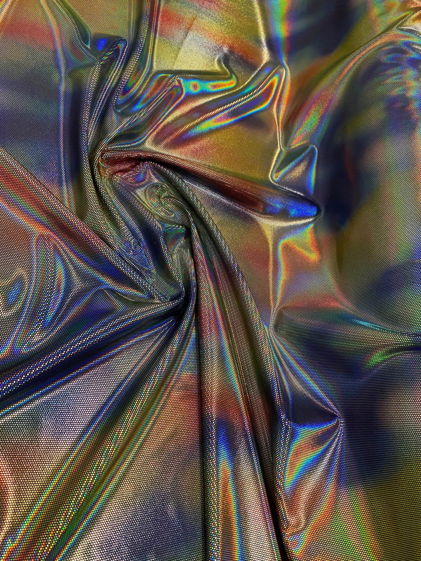 Luxury Spectrum iridescent hologram metallic foil on stretch velvet 58/60” 4-way stretch 58/60” Sold by the YD. Ships worldwide from L.A CA.