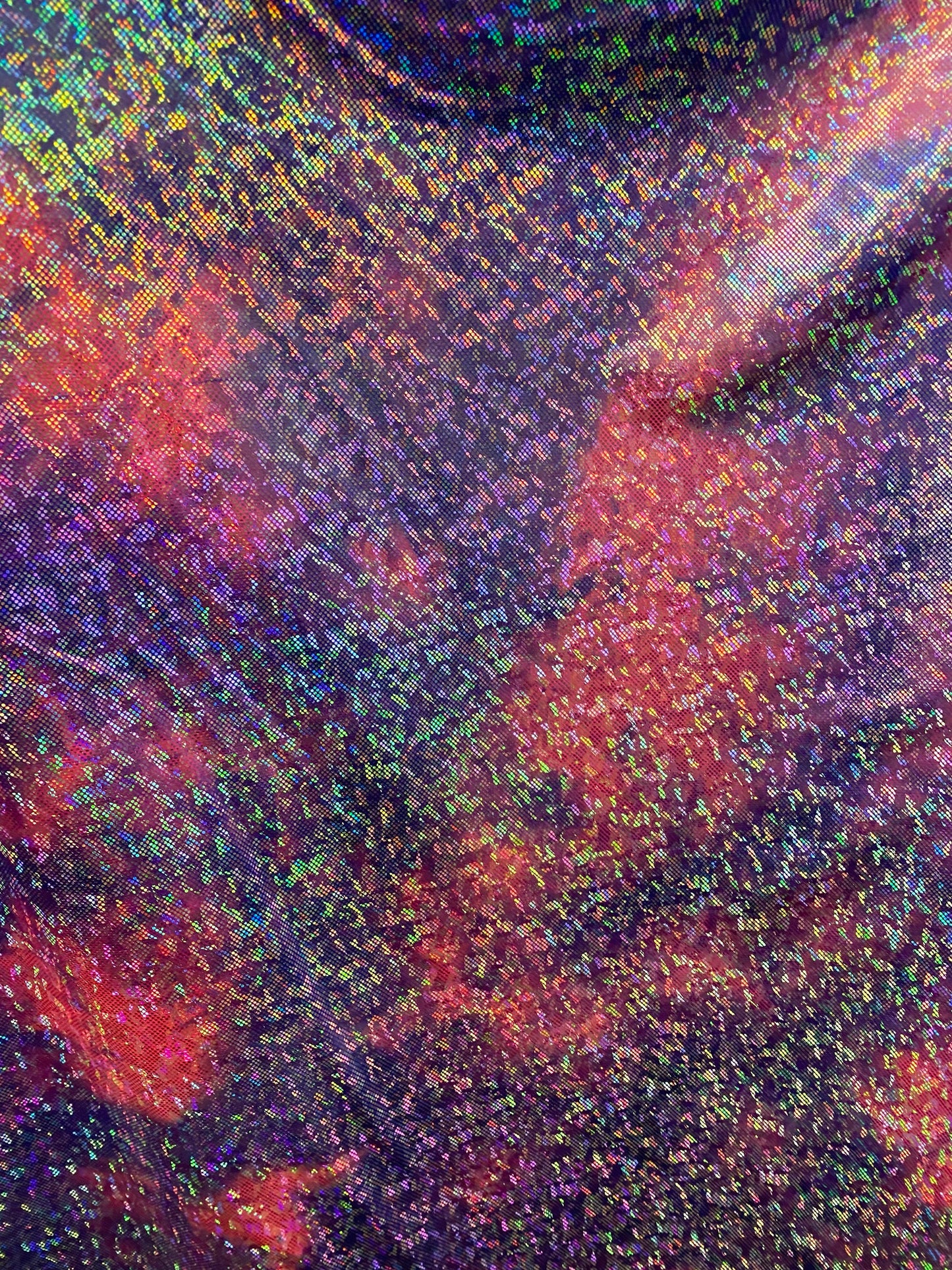 New tie dye cotton candy shattered glass metallic nylon spandex with hologram foil 4-way stretch 58/60” Sold by the YD.