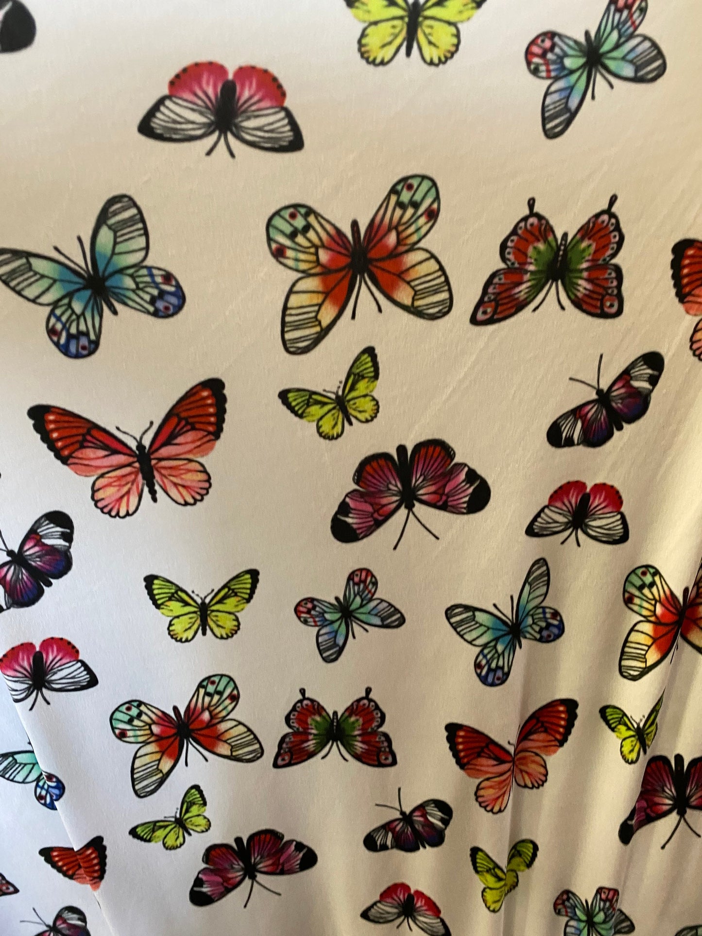New butterflies design multicolor print on good quality stretch poly spandex 4-way stretch 58/60” Sold by the YD. Ships worldwide