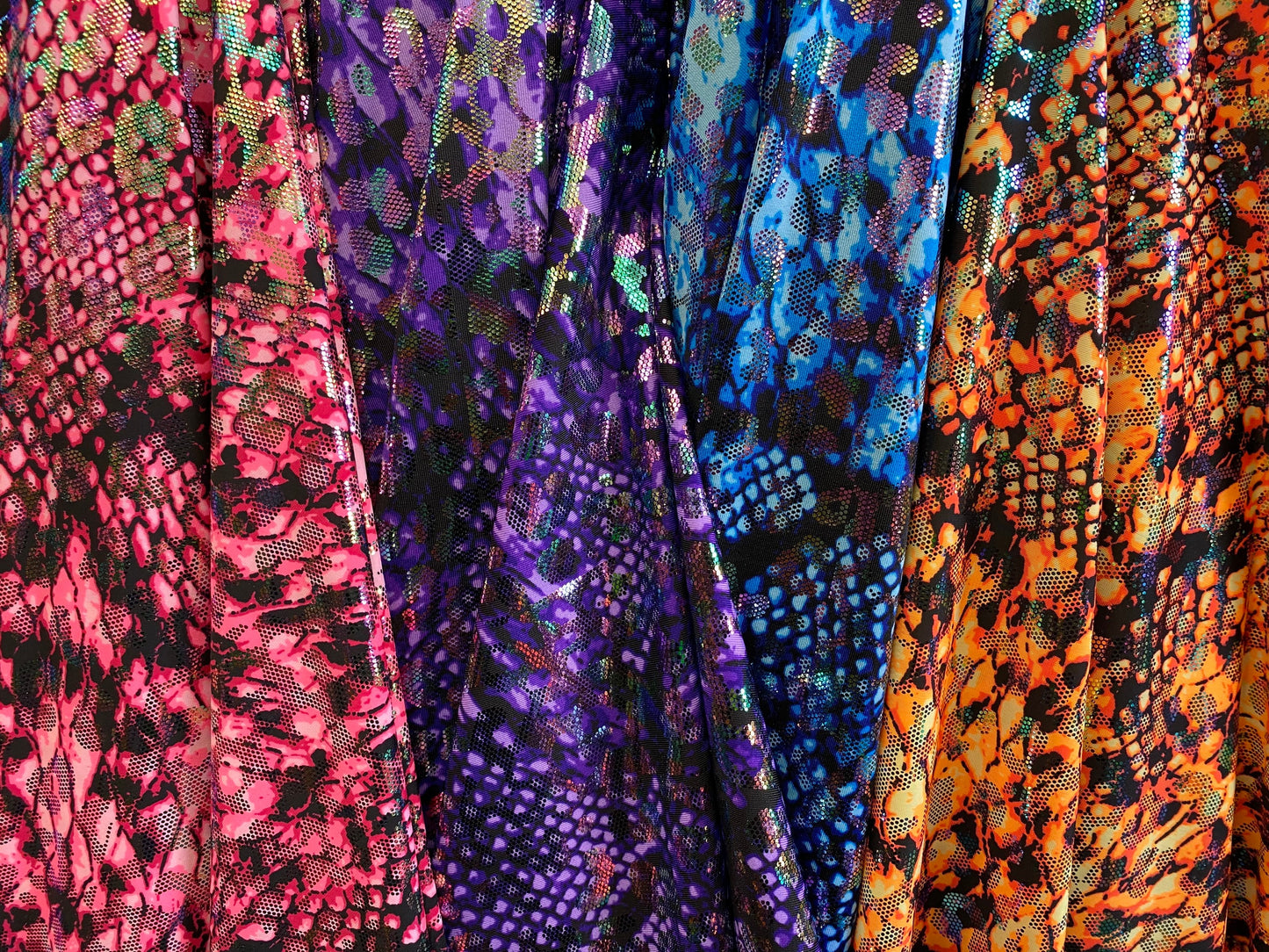 Iridescent metallic nylon spandex Cobra design 4way stretch 58/60” Sold by the YD. Ships worldwide from Los Angeles California USA