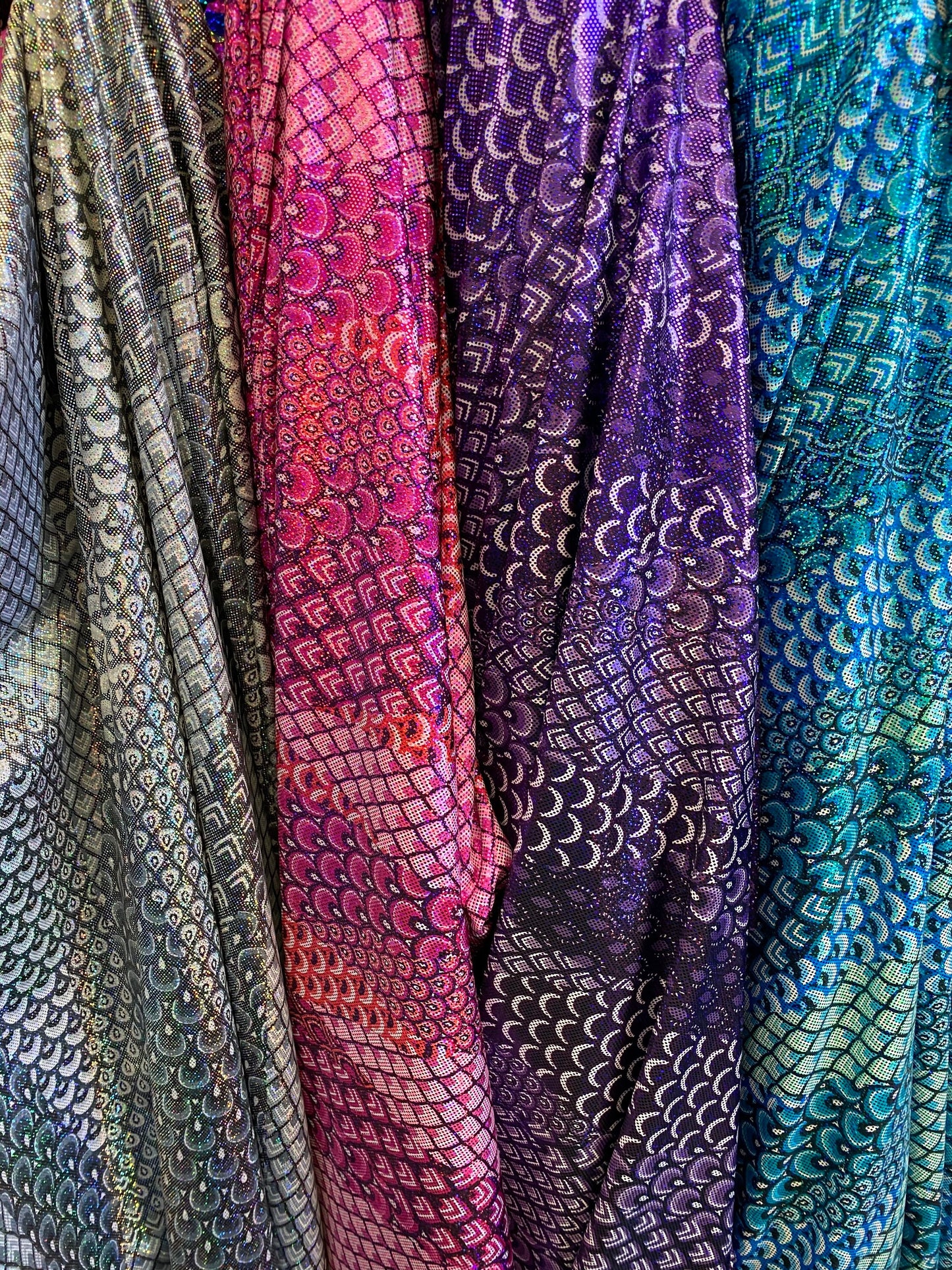 New Exotic peacock design hologram metallic nylon spandex 4-way stretch 58/60” Sold by the YD. Ships worldwide from Los Angeles California