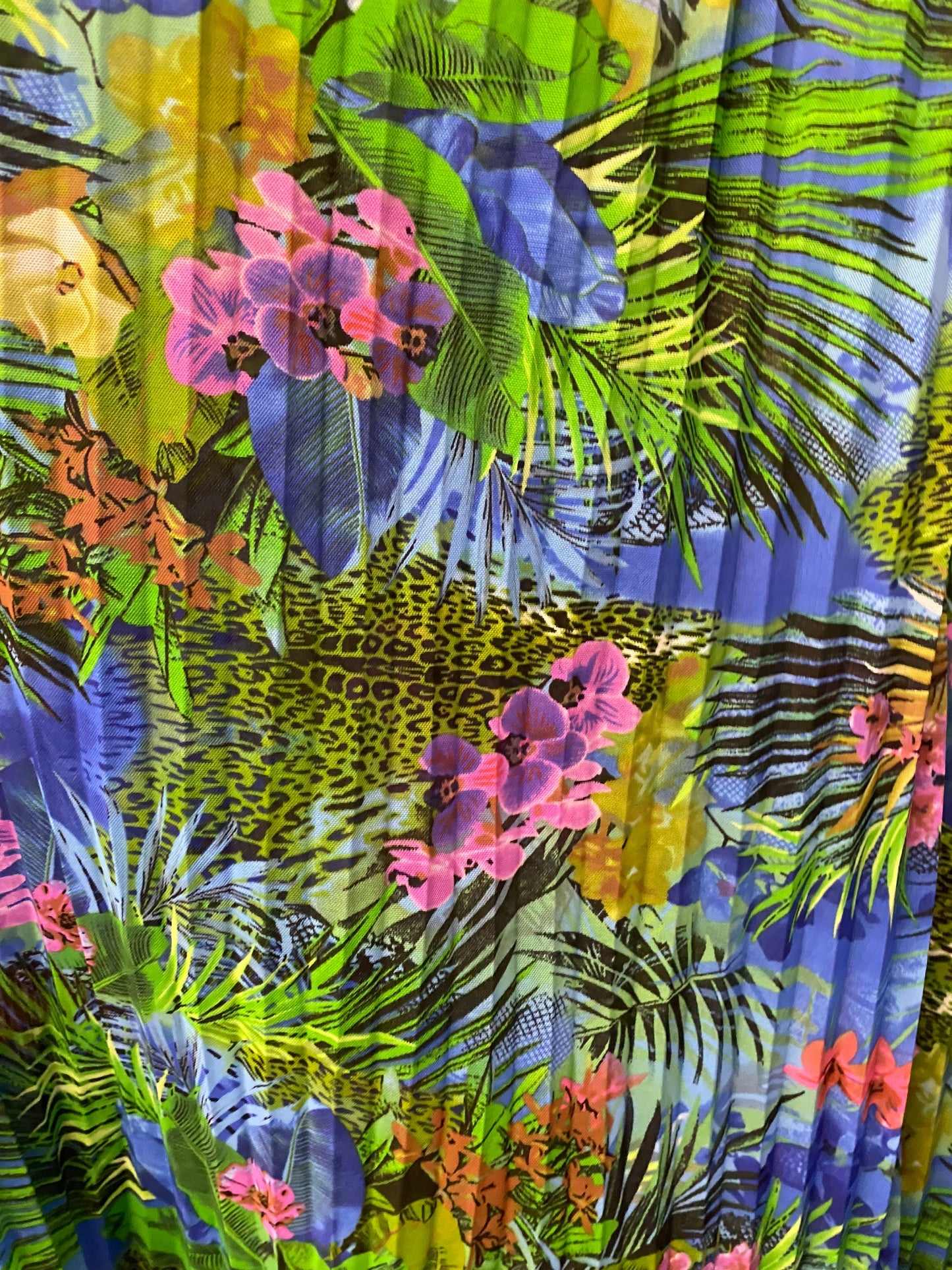 New Hiding Exotic Leopard design print on pleated power mesh 4-way stretch 58/60” Sold by the YD. Ships worldwide from Los Angeles CA USA.