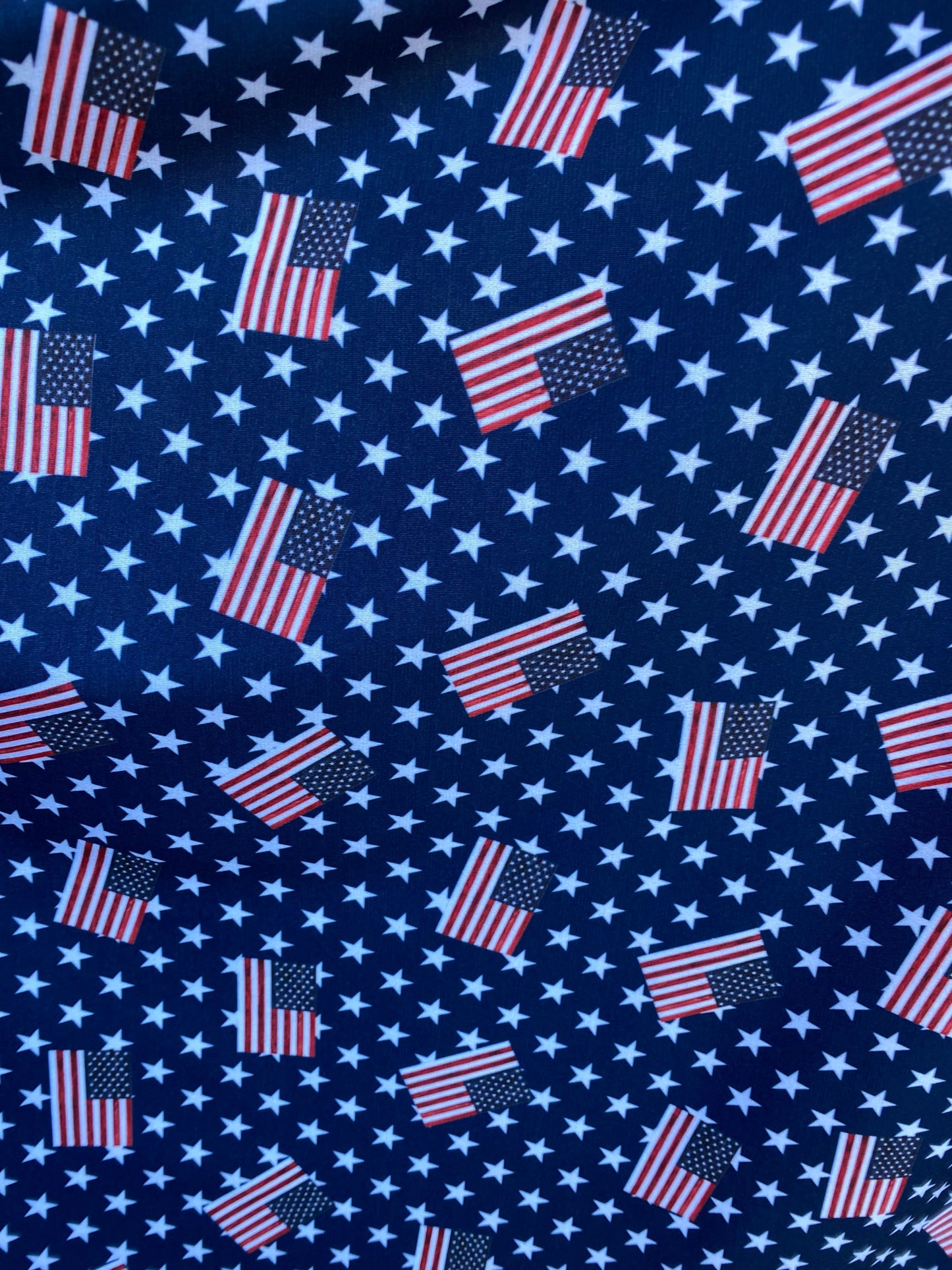 American flag design with freedom stars print on poly spandex light weight 4-way stretch 58/60” Sold by the YD. Ships worldwide from L.A CA