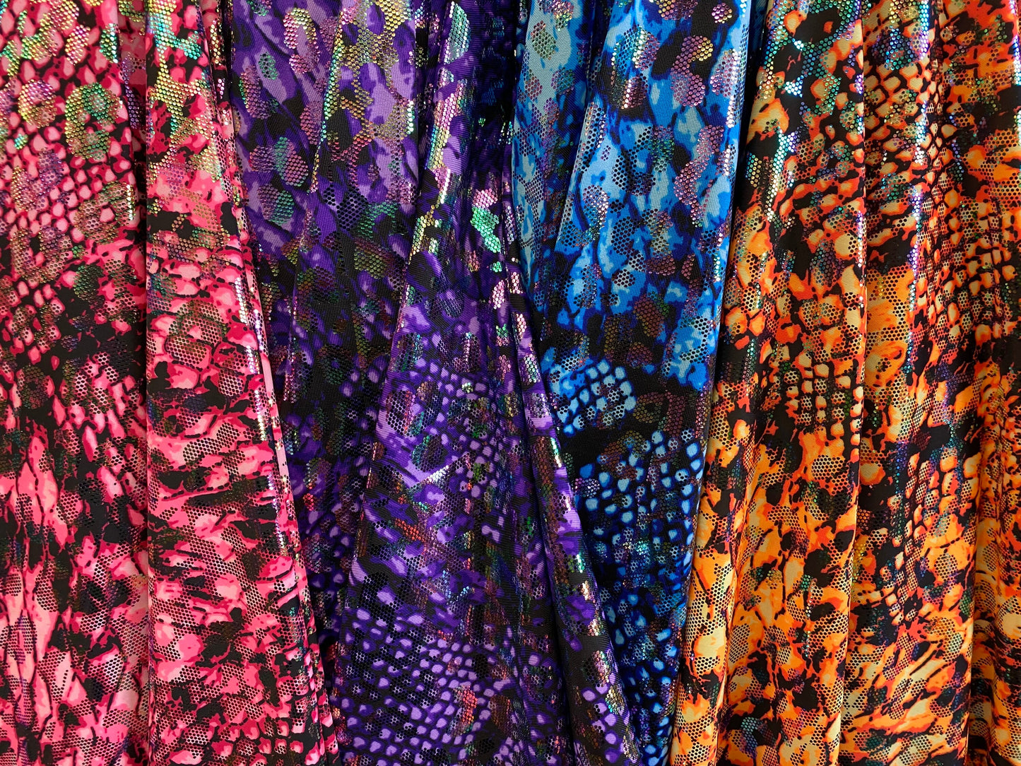 Iridescent metallic nylon spandex Cobra design 4way stretch 58/60” Sold by the YD. Ships worldwide from Los Angeles California USA