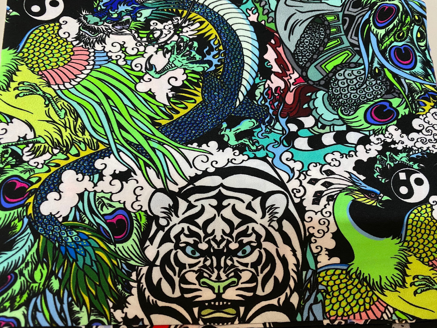 New Exotic Tattoo Jungle design multi animal print on best quality of nylon spandex 4-way stretch 58/60” Sold by the YD.