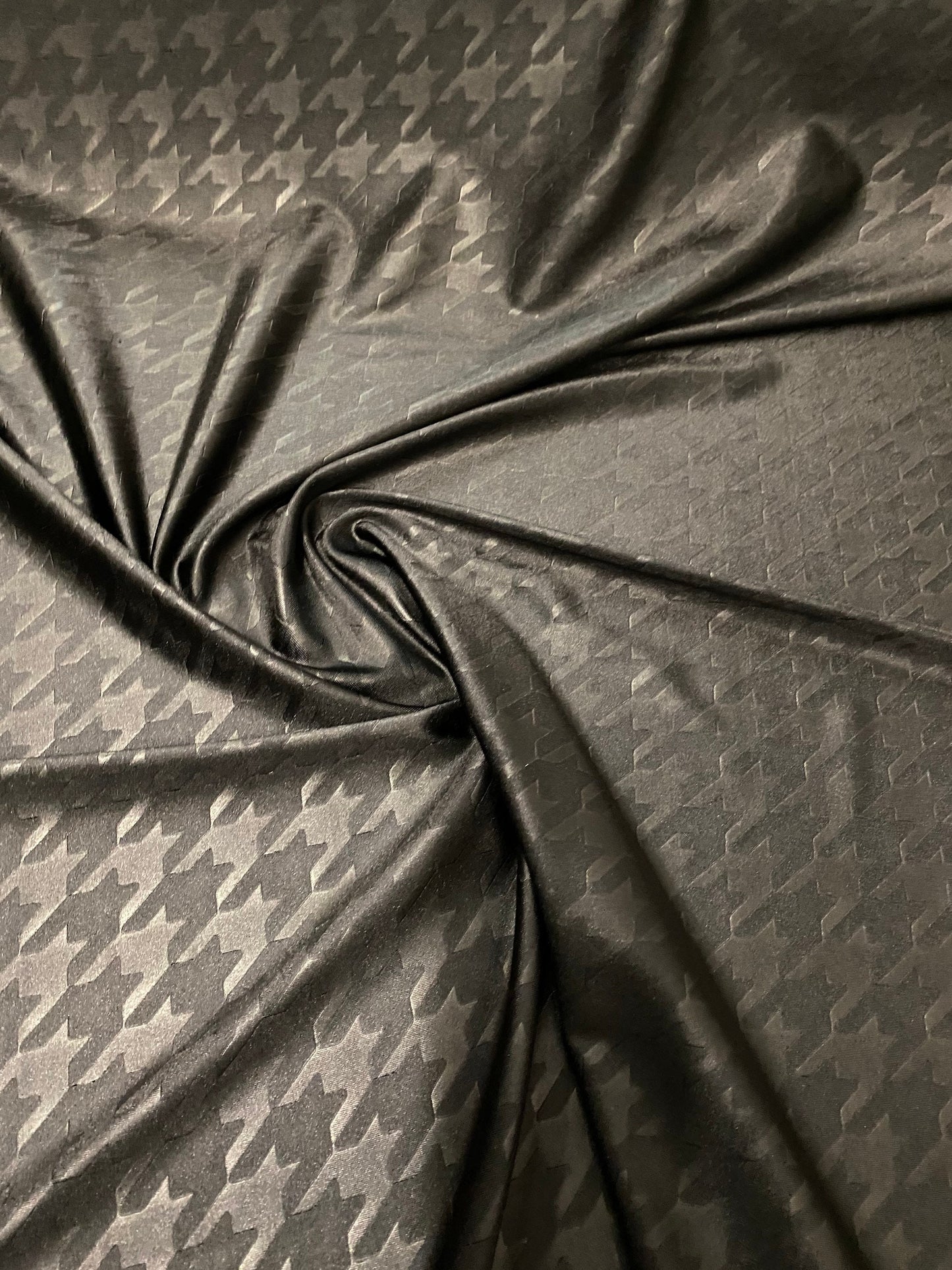 Houndstooth jumbo embossed great quality of nylon spandex 4-way stretch 58/60” Sold by the YD. Ships worldwide from Los Angeles California