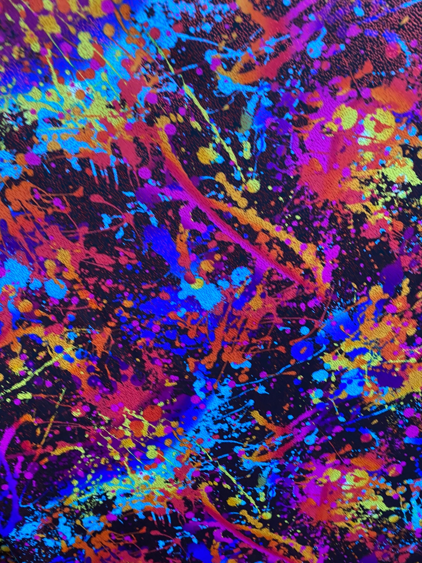 Graffiti paint design multi nylon spandex with foil 4-way stretch 58/60” sold by the YD. Ships worldwide from Los Angeles California.