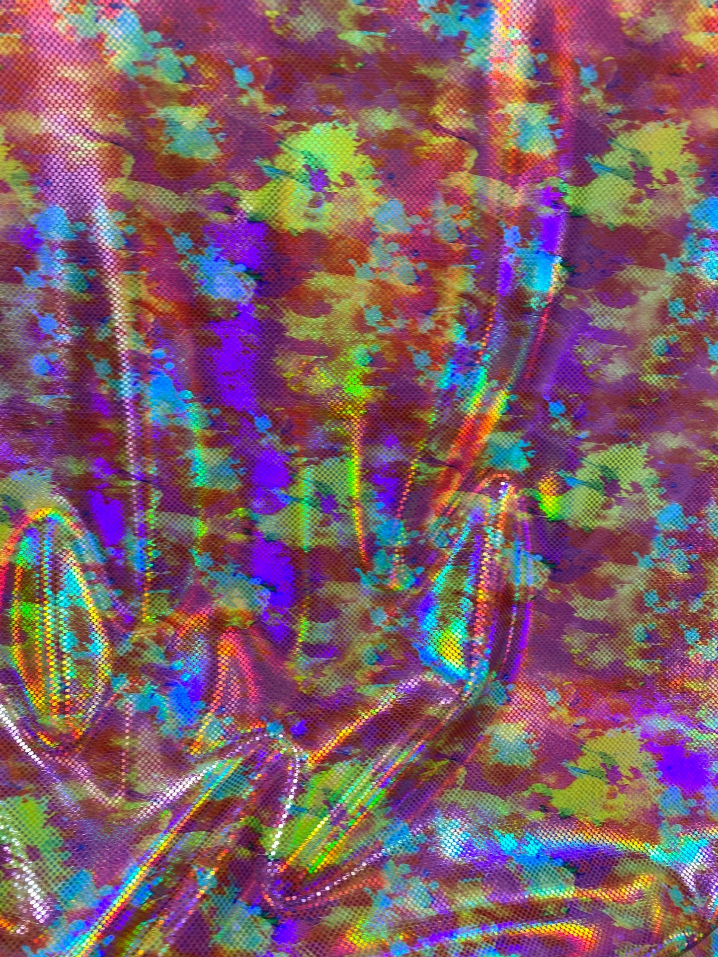 New modern abstract design yellow/pink/red digital foil print lacer hologram metallic nylon spandex 4-way stretch 58/60” Sold by the YD.