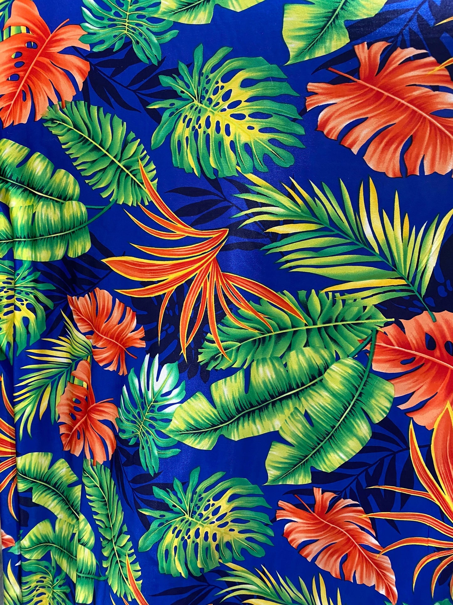 New Hawaiian design Sapphire multicolor print on poly spandex medium weight 4-way stretch 58/60” Sold by the YD. Ships Worldwide from L.A CA