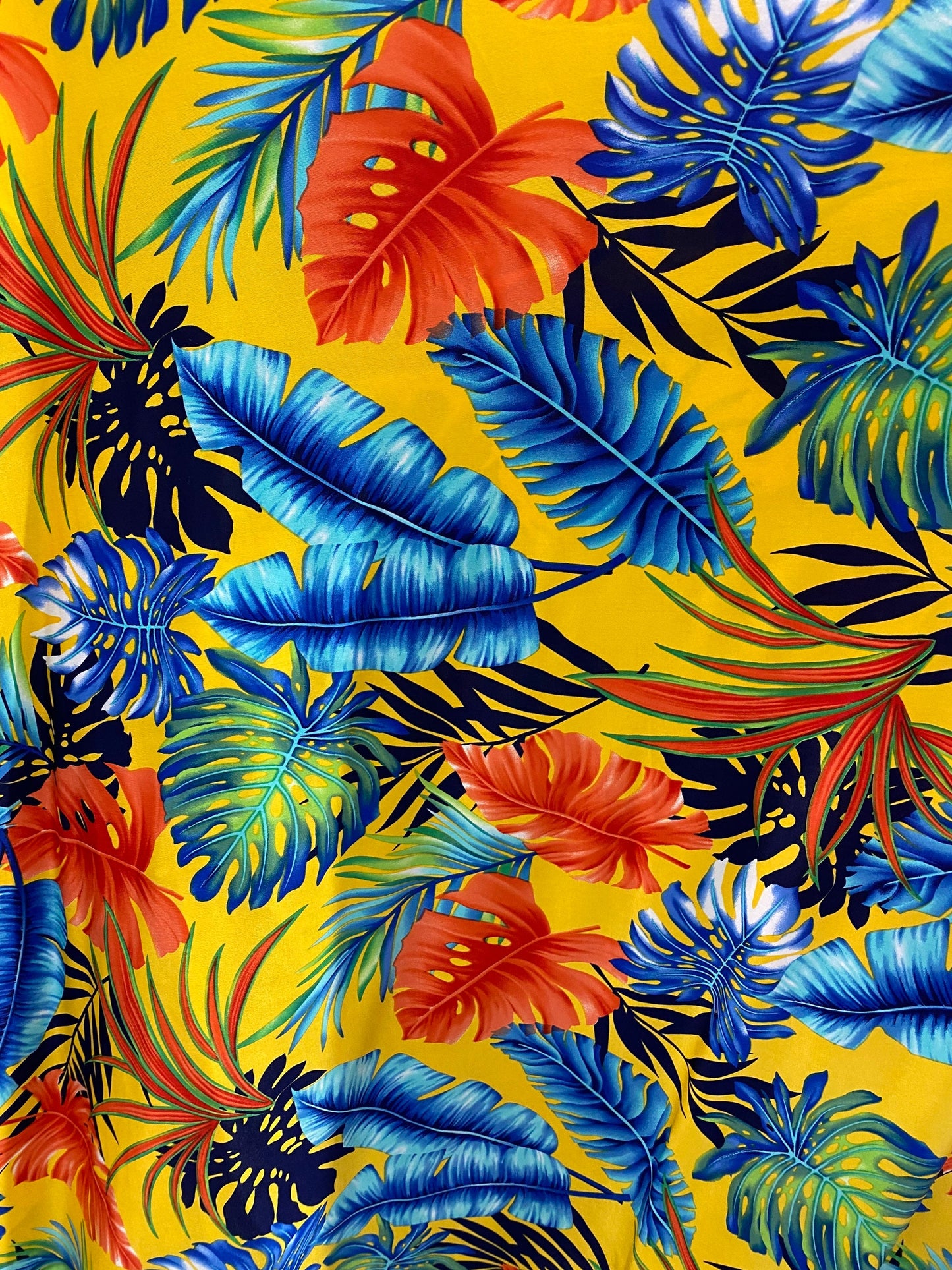 New Hawaiian design yellow/multicolor print on poly spandex medium weight 4-way stretch 58/60” Sold by the YD. Ships Worldwide from L.A CA