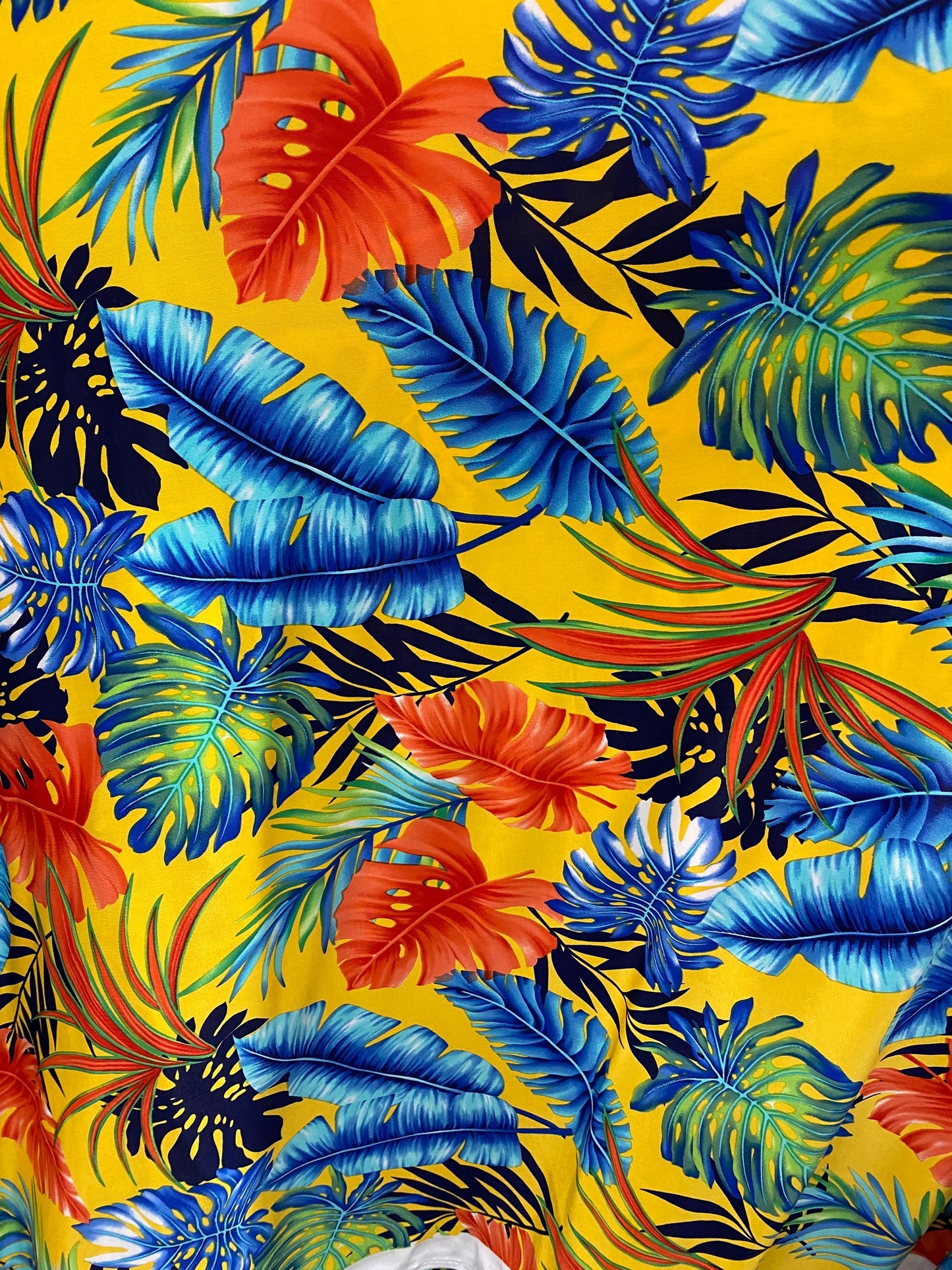New Hawaiian design yellow/multicolor print on poly spandex medium weight 4-way stretch 58/60” Sold by the YD. Ships Worldwide from L.A CA