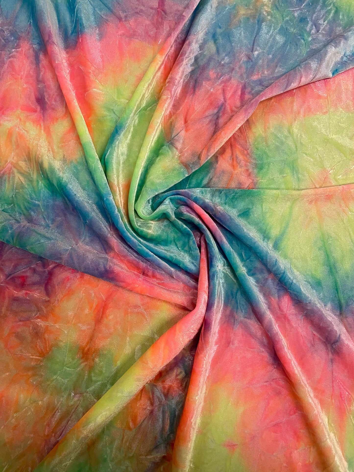 Rainbow multi pastel tie dye Luxury crushed velvet 4-way stretch 58-69” Sold by the YD. Ships Worldwide from Los Angeles California USA.